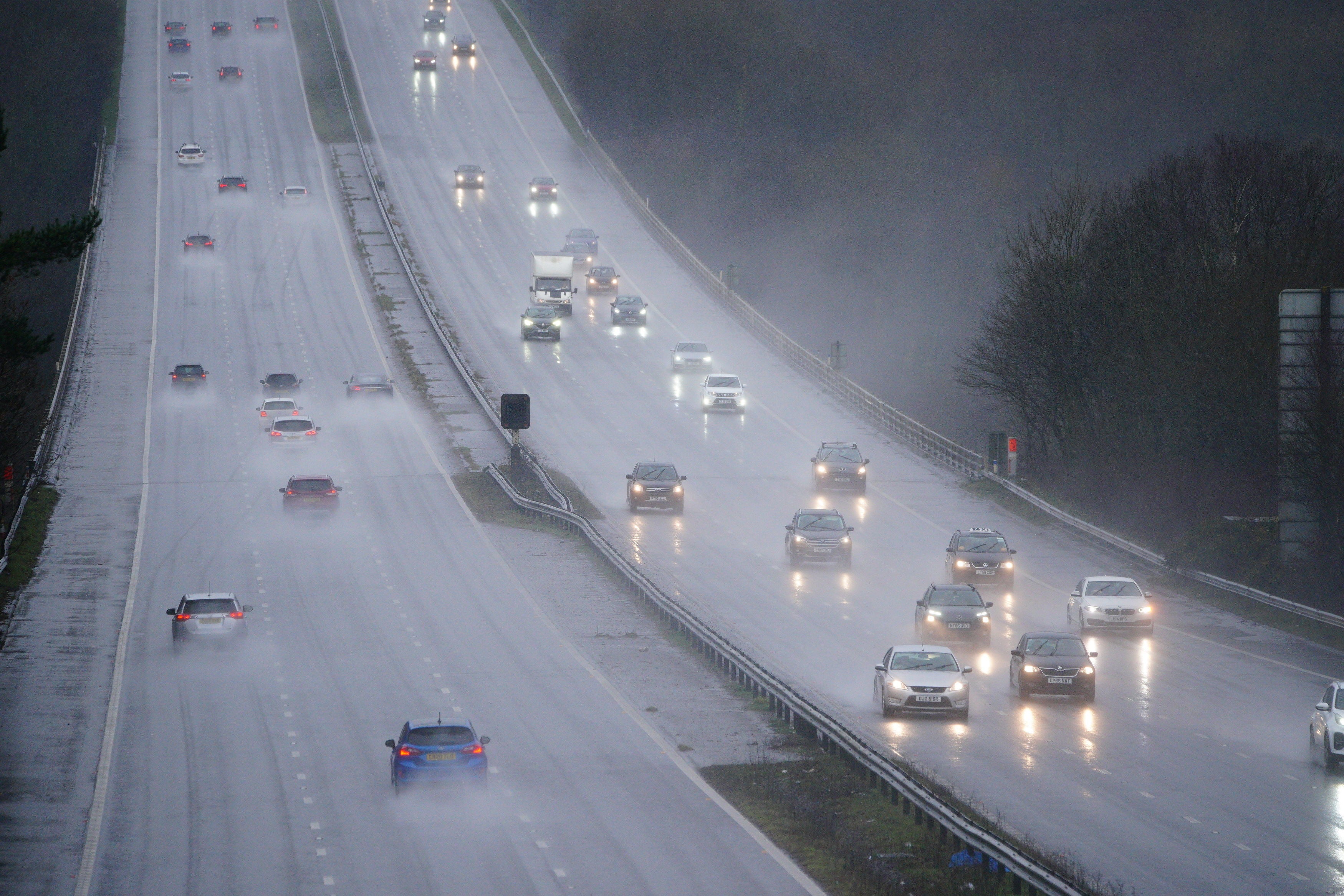 Traffic on the M4 motorway at Bridgend in Wales during wet weather