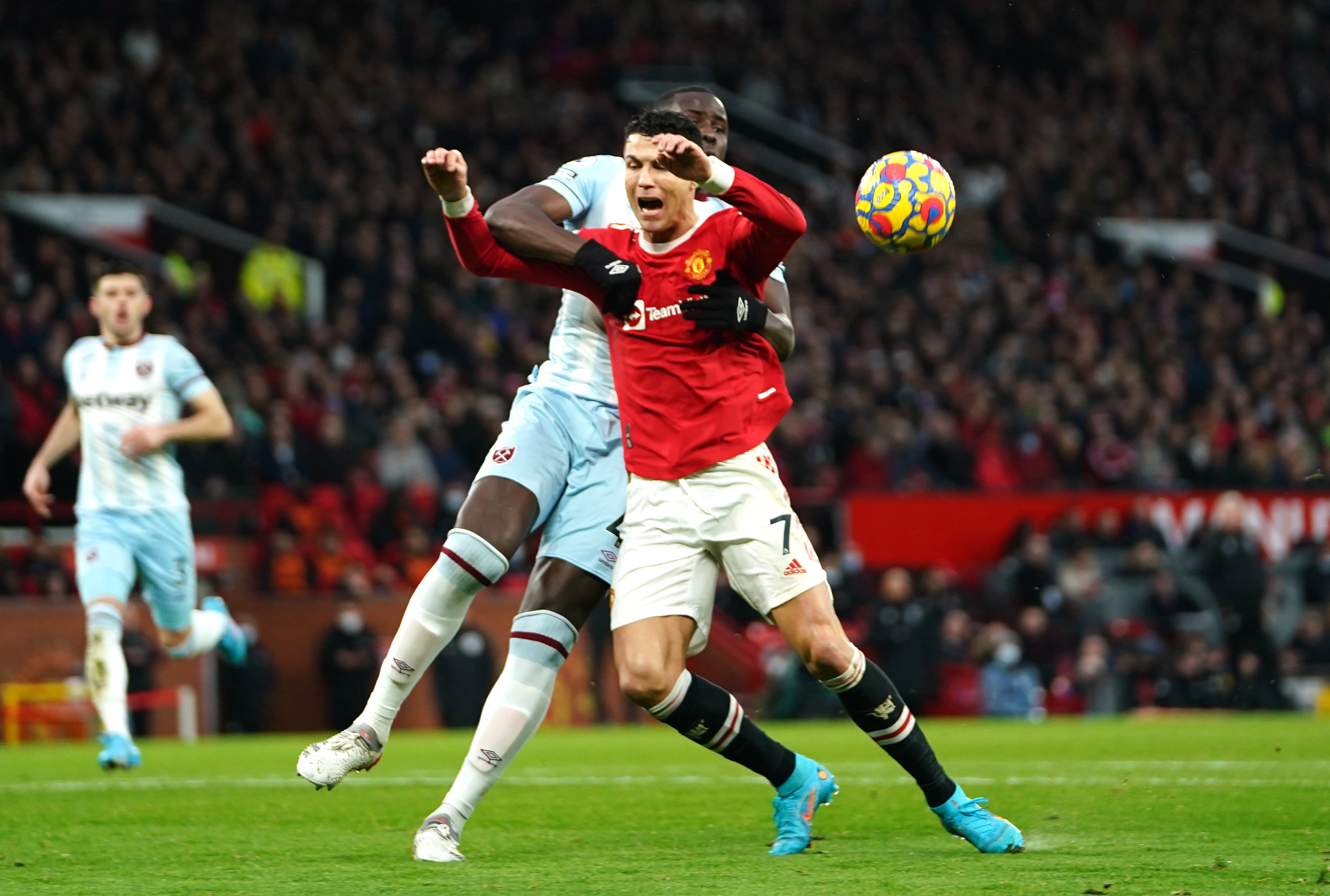 Cristiano Ronaldo, front, goes down under Kurt Zouma’s challenge (Zac Goodwin/PA)