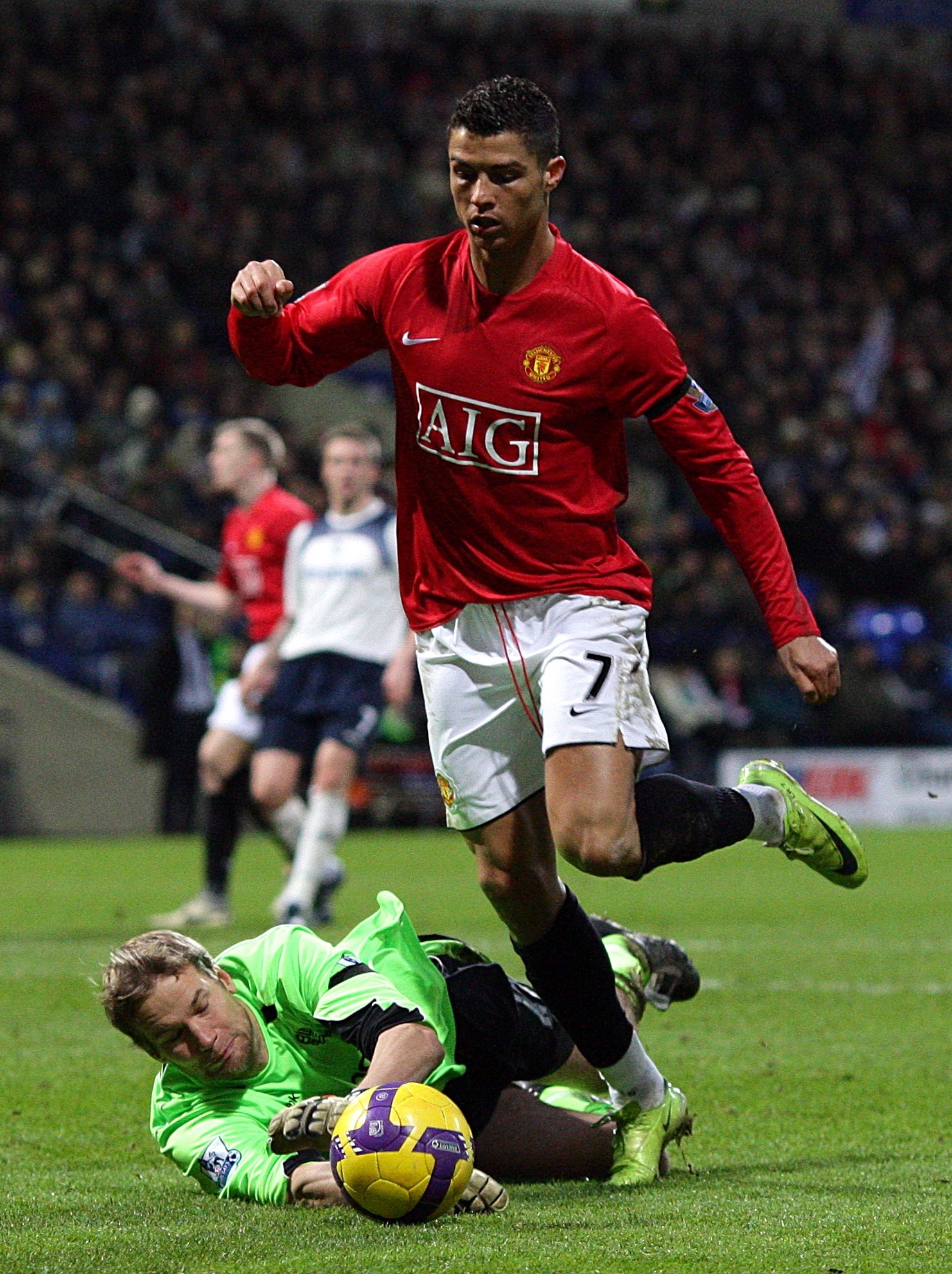 Bolton Wanderers’ Jussi Jaaskelainen, left, saves to extend Cristiano Ronaldo’s 2008-09 scoring drought to seven games (Martin Rickett/PA)