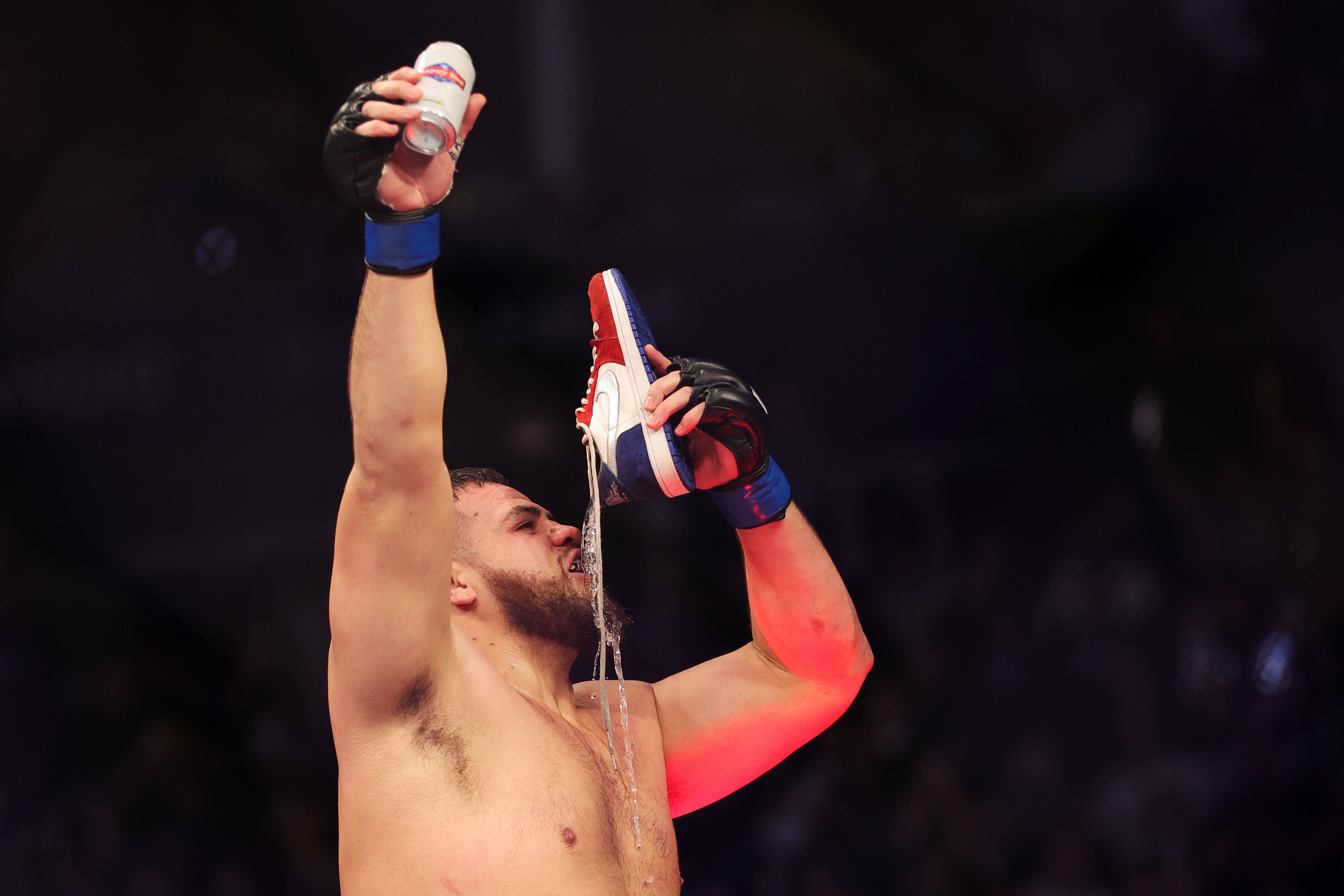 Tai Tuivasa celebrates after knocking out Derrick Lewis at UFC 271