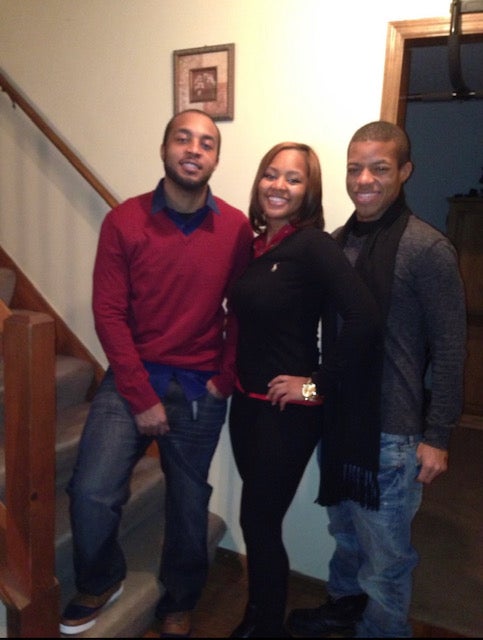 Moses Moseley, right, poses with his siblings; within days, he was found dead in his locked car in a Georgia parking lot