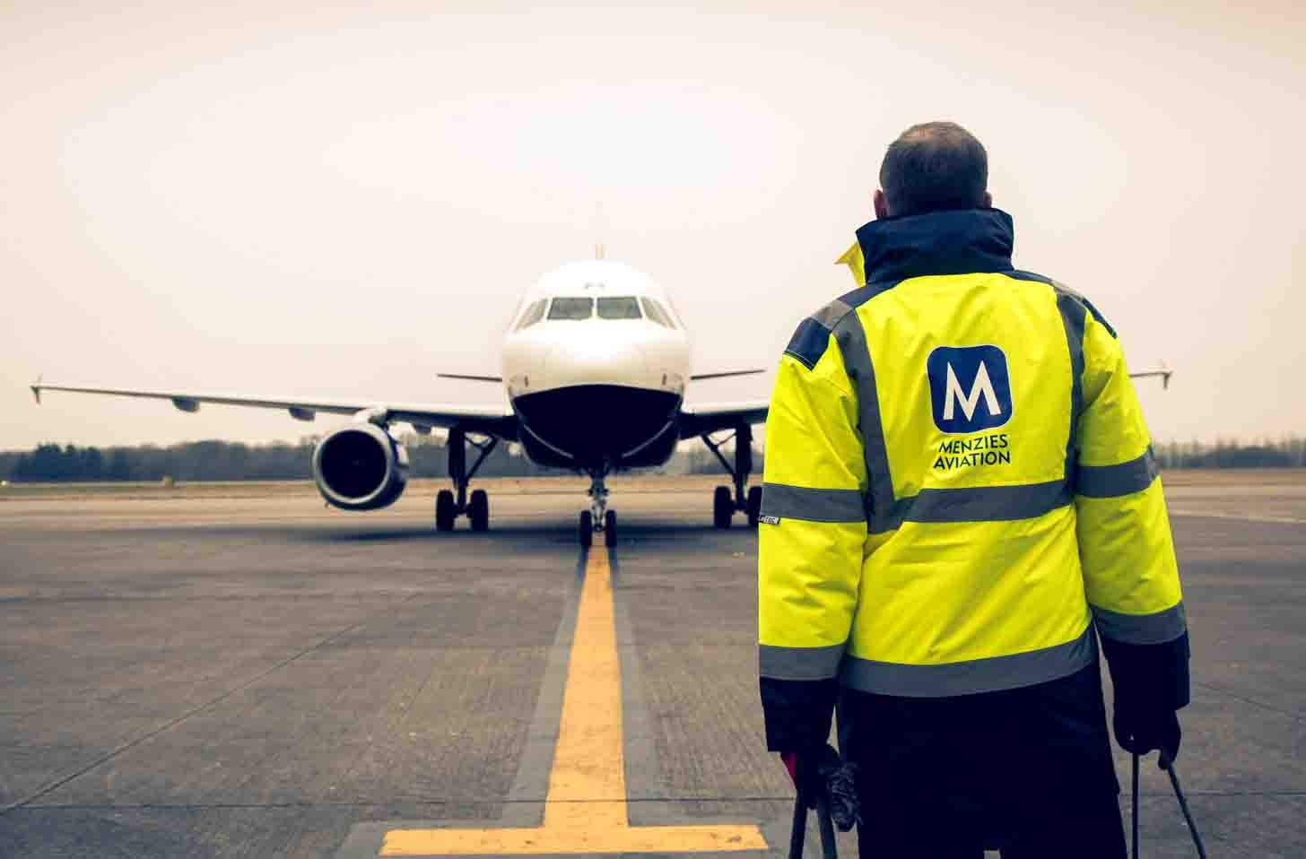 John Menzies undated handout photo of a member of their staff. The airport services and support business has rejected a takeover move and described it as “opportunistic” (John Menzies/PA)