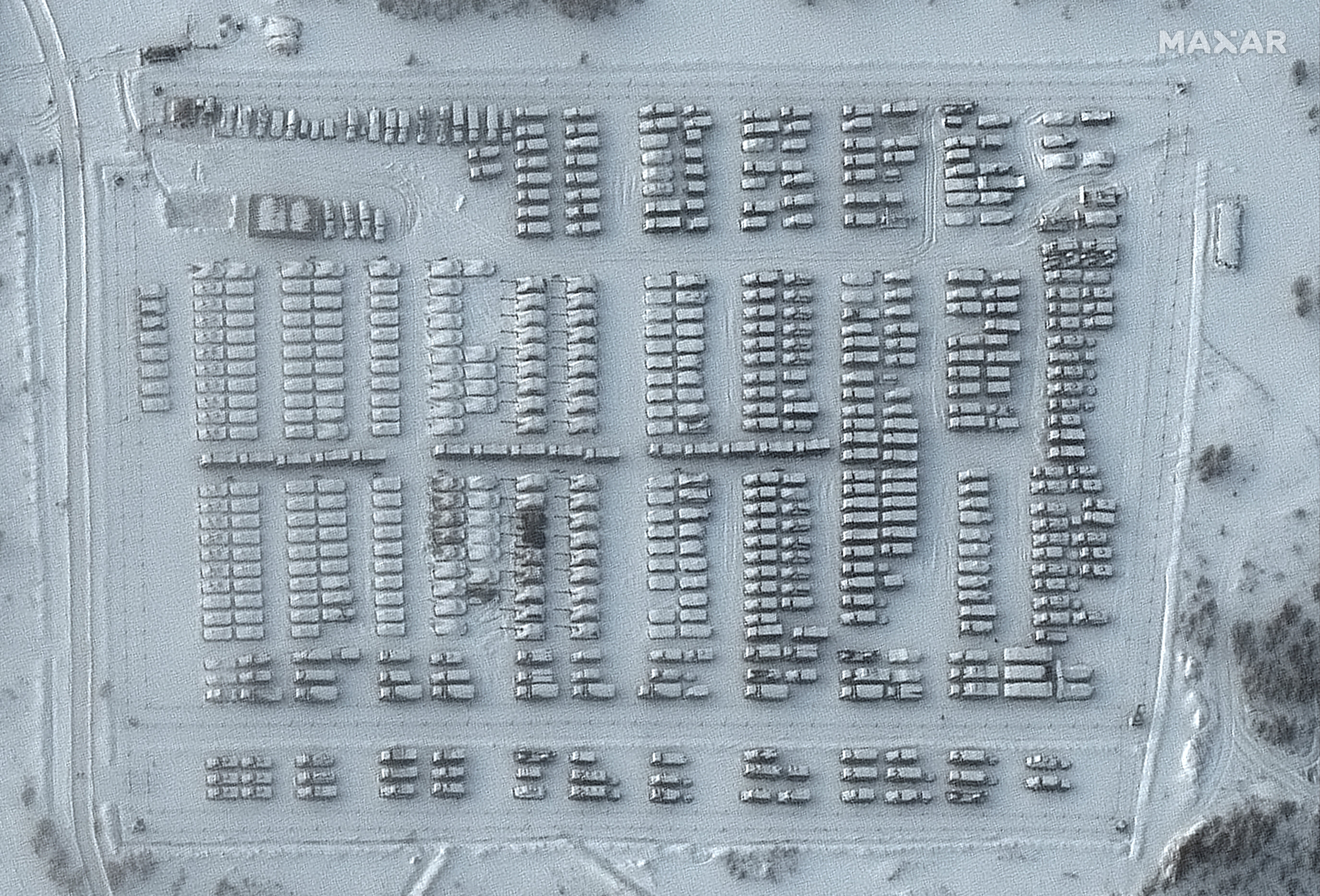 A satellite image shows the overview of a battle group vehicle park in Yelnya, Russia,