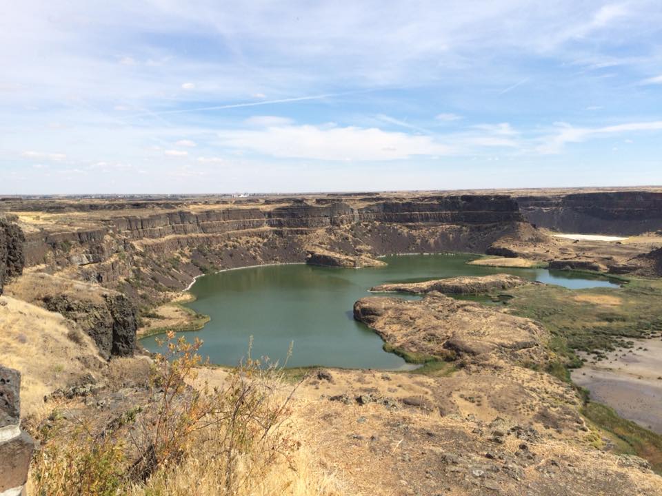 Enormous volumes of floodwater from the Missoula megafloods once poured over Dry Falls in Washington state, which stretches 3.5 miles wide and drops 400 feet to a plunge pool now fed by groundwater