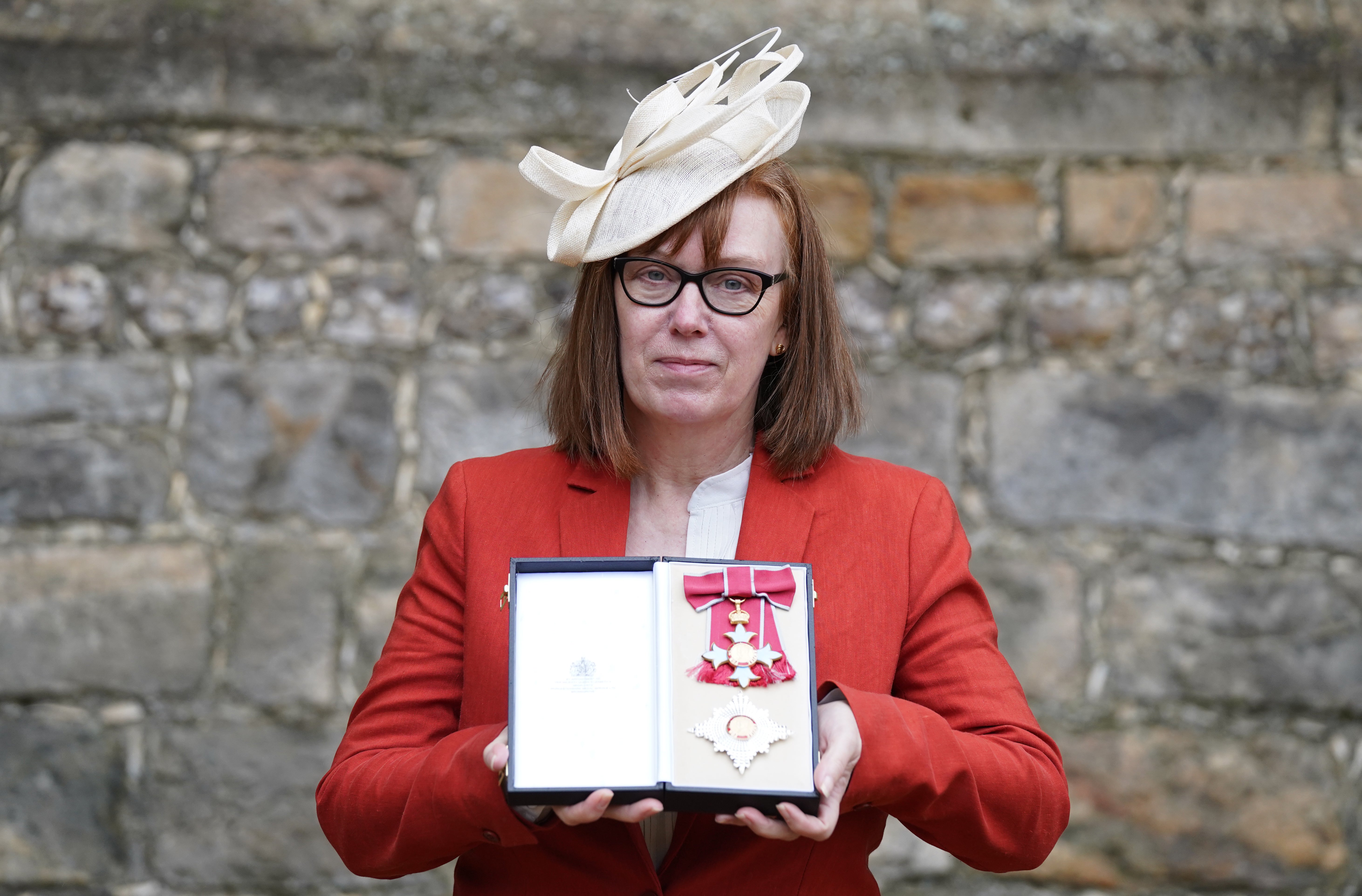 Professor Dame Sarah Gilbert from Oxford after she was made a Dame Commander of the British Empire by the Princess Royal at Windsor Castle (Steve Parsons/PA)