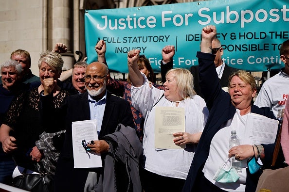 Former subpostmasters celebrated outside the Royal Courts of Justice in London last year, after they were cleared of wrongdoing