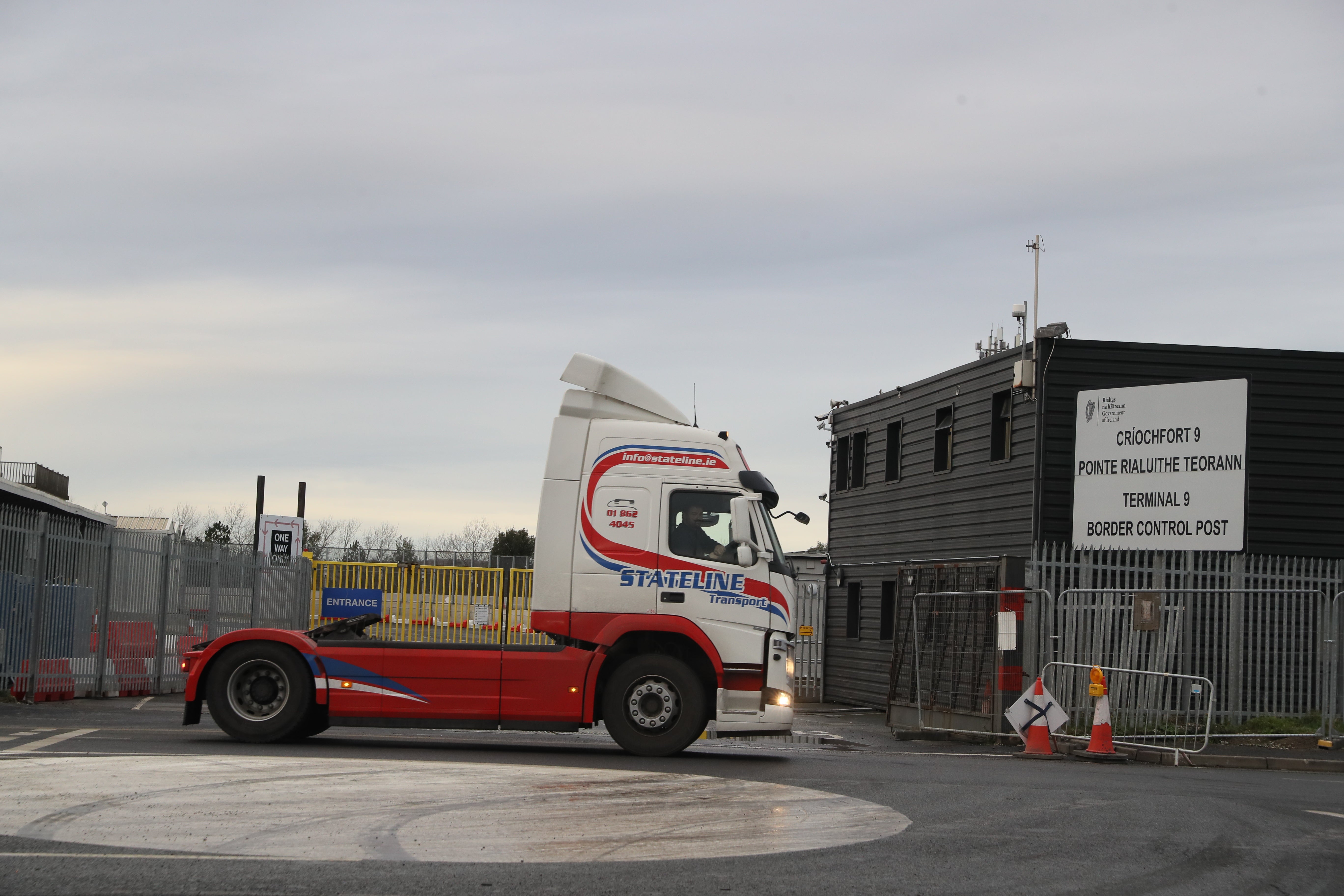 A truck passes a Border Control Post in Dublin Port (Brian Lawless/PA)