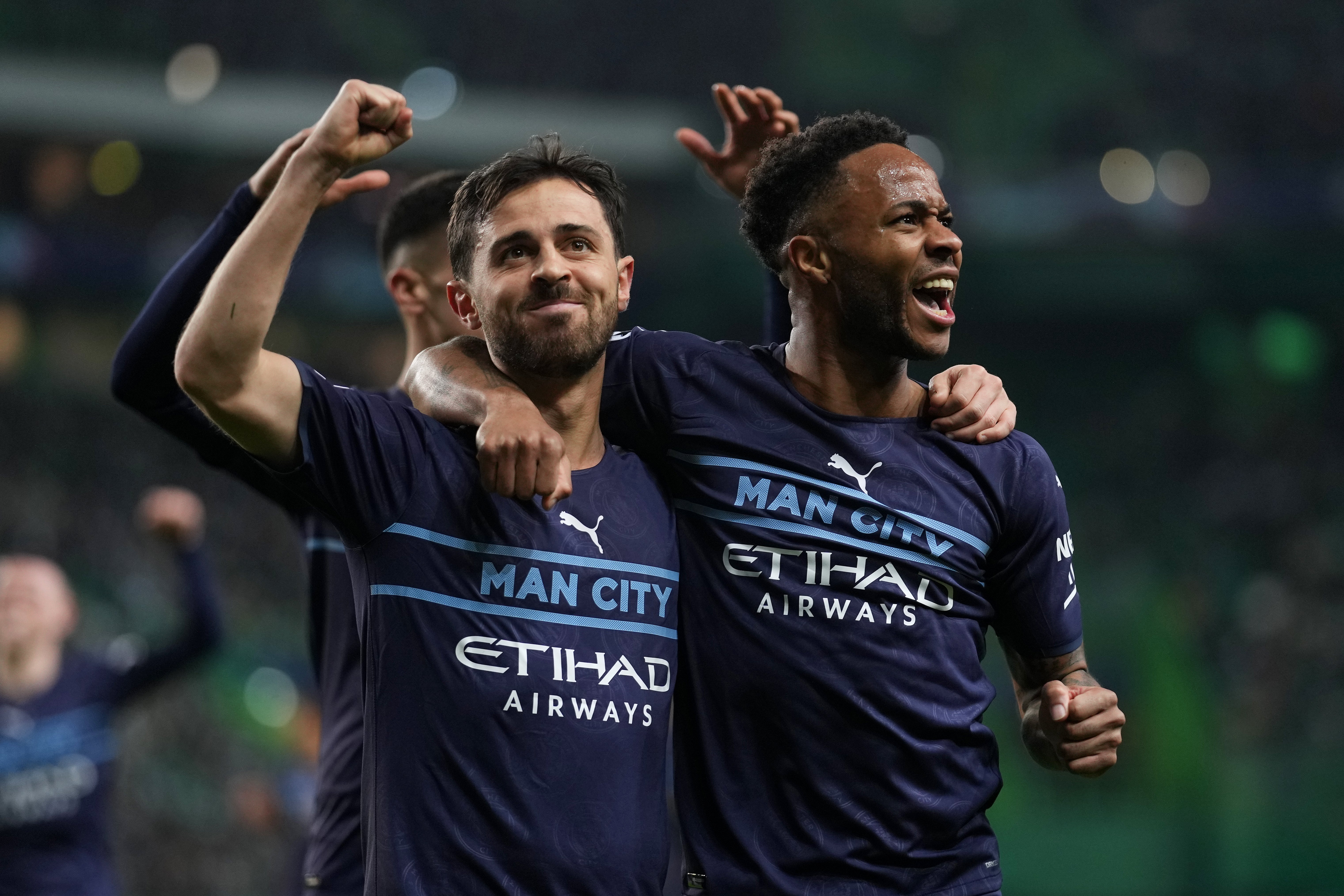 Raheem Sterling celebrates with Bernardo Silva after scoring Manchester City’s fifth goal