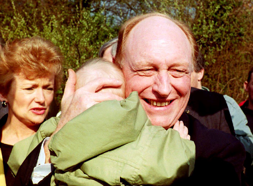 Former Labour leader Neil Kinnock with his wife Gleyns outside a polling station in 1992