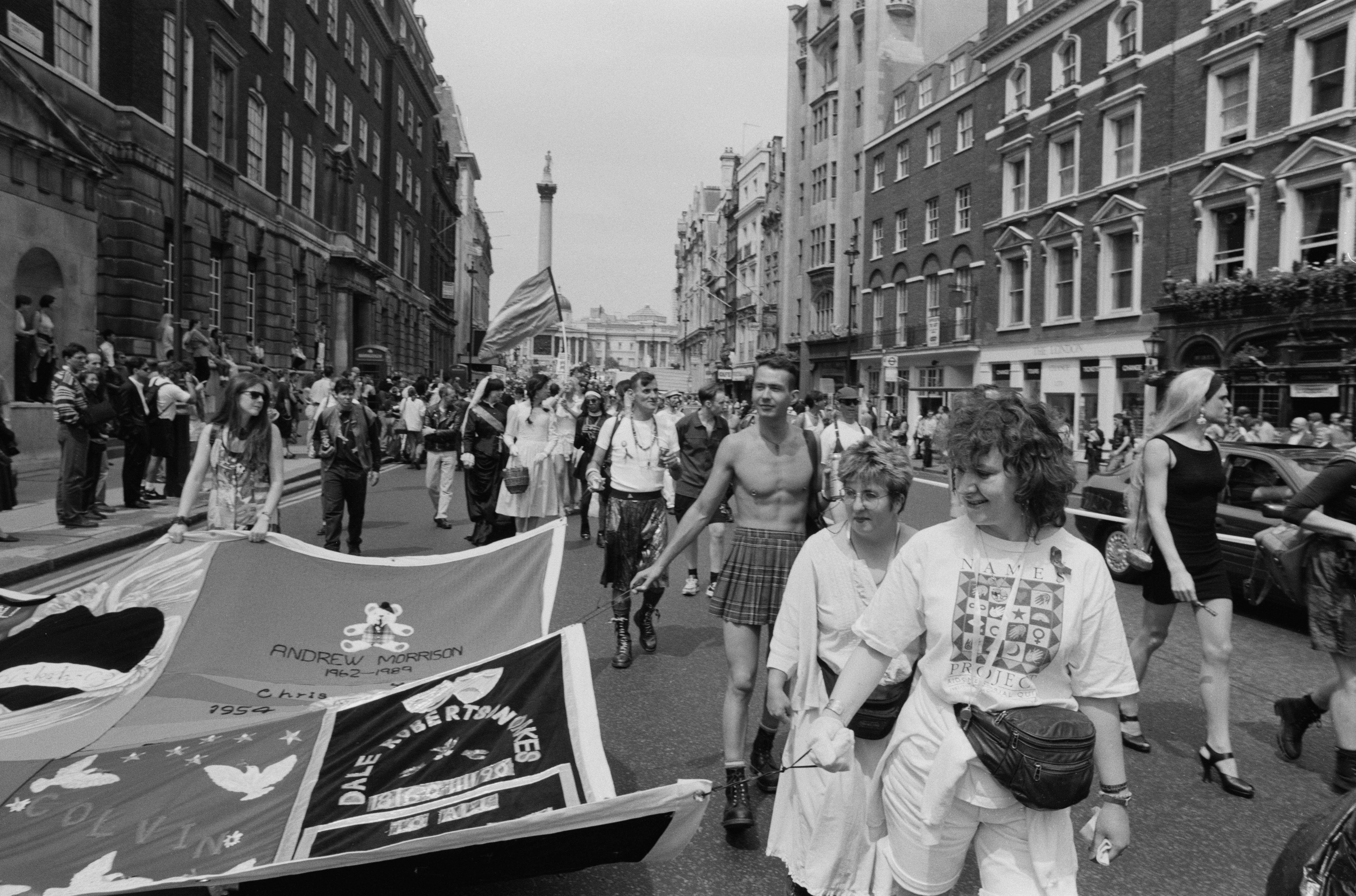 The Aids Memorial Quilt carried by marchers at the Pride event in 1994