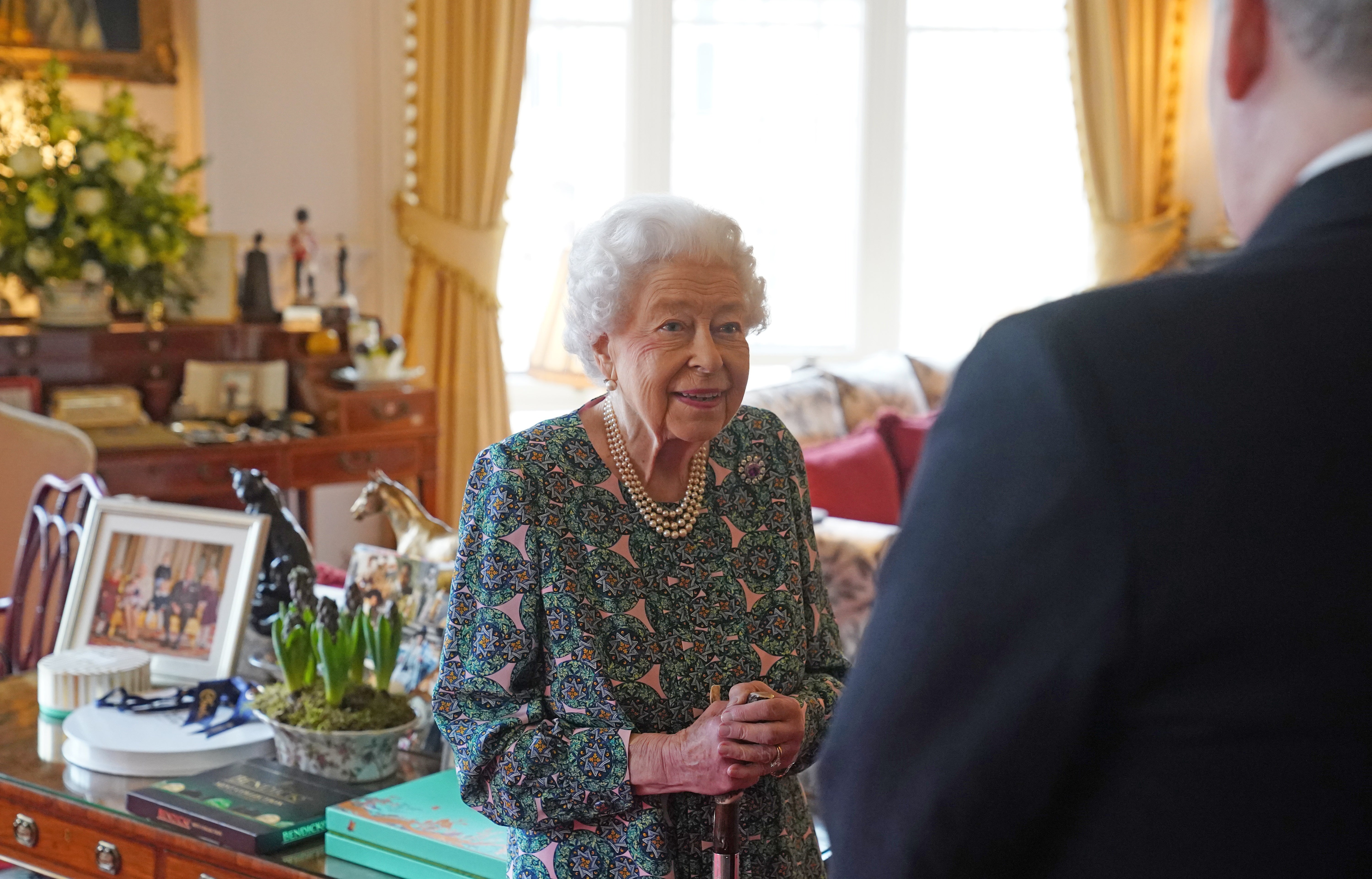 The Queen was performing her royal duties today, hours after her son’s settlement was announced