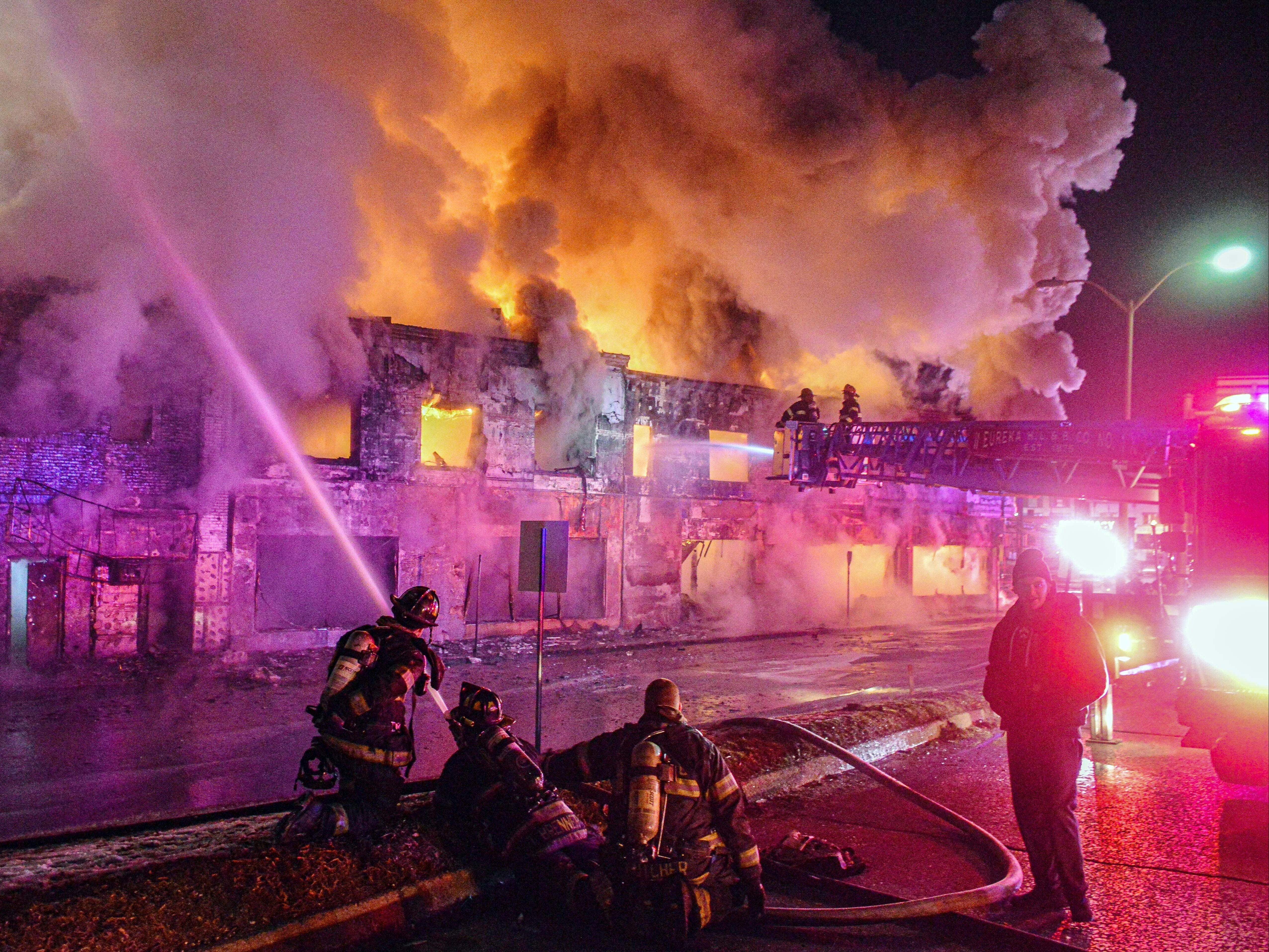 Emergency personnel work at the site of gas tanker accident in Rockville Centre, N.Y., early Wednesday, Feb. 16, 2022