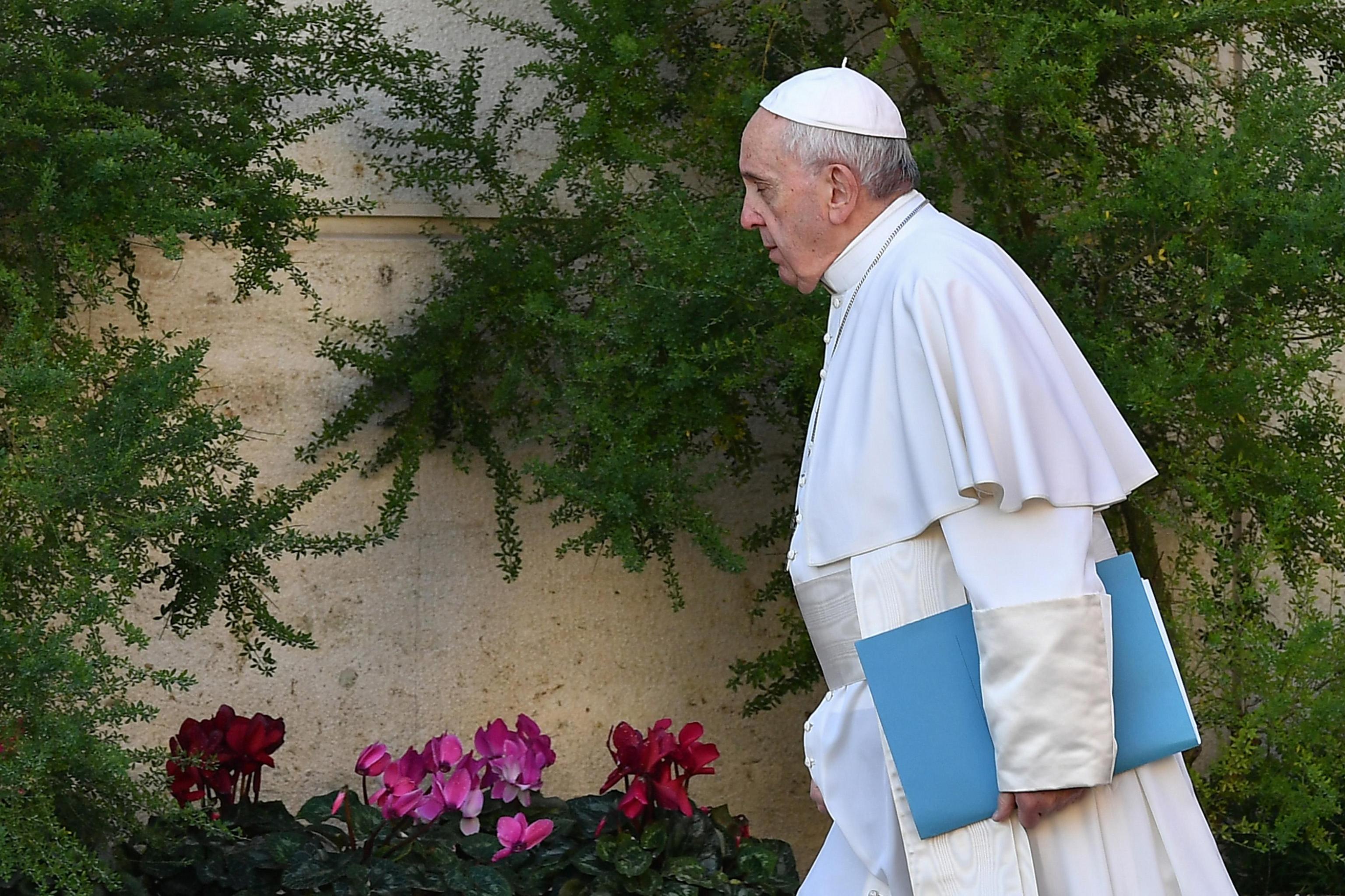 Pope Francis arrives at a global child protection summit on the sex abuse crisis within the Catholic Church