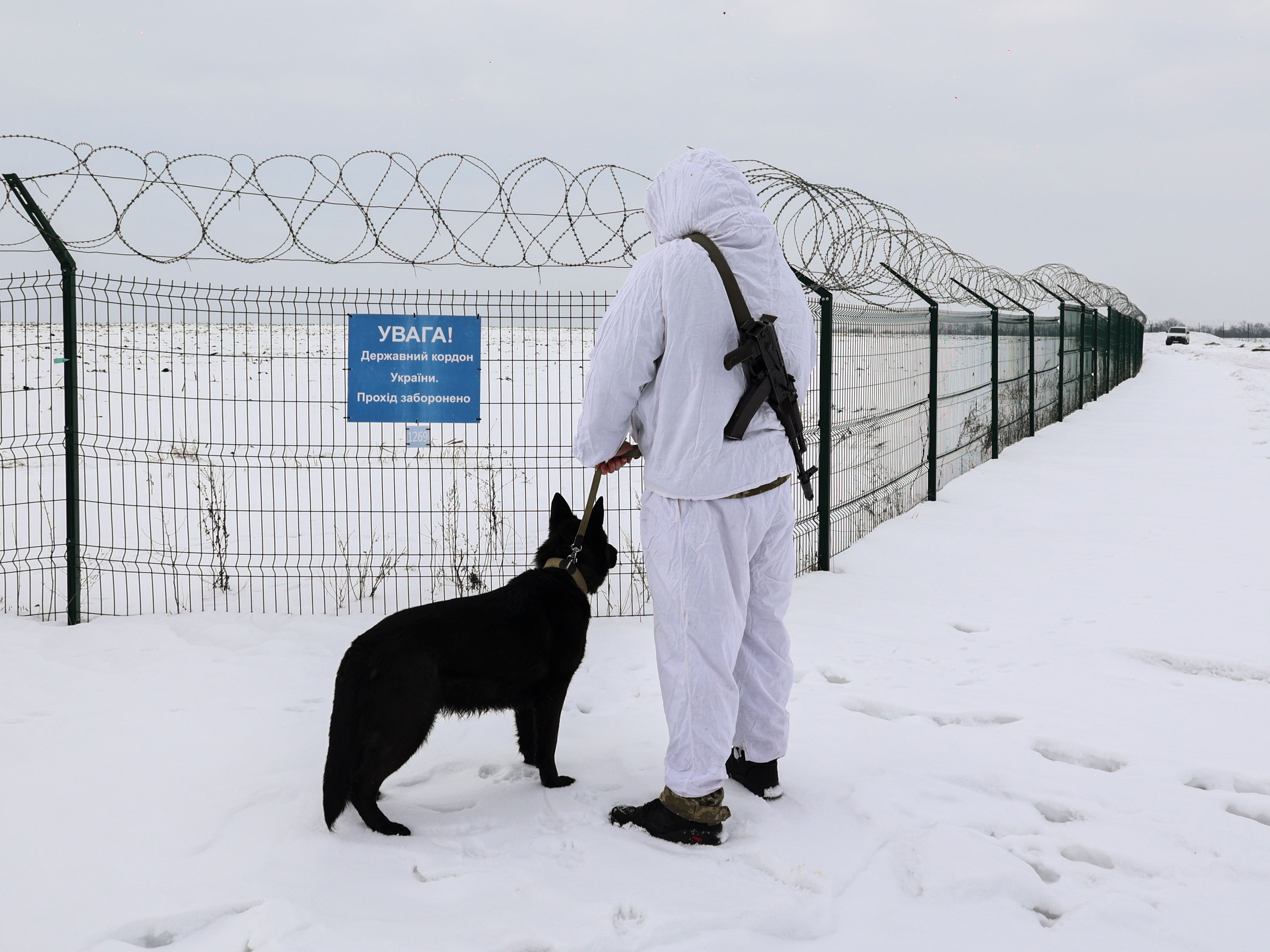 Ukrainian border guards patrol a Ukraine - Russia border not far from Eastern Ukrainian city of Kharkiv