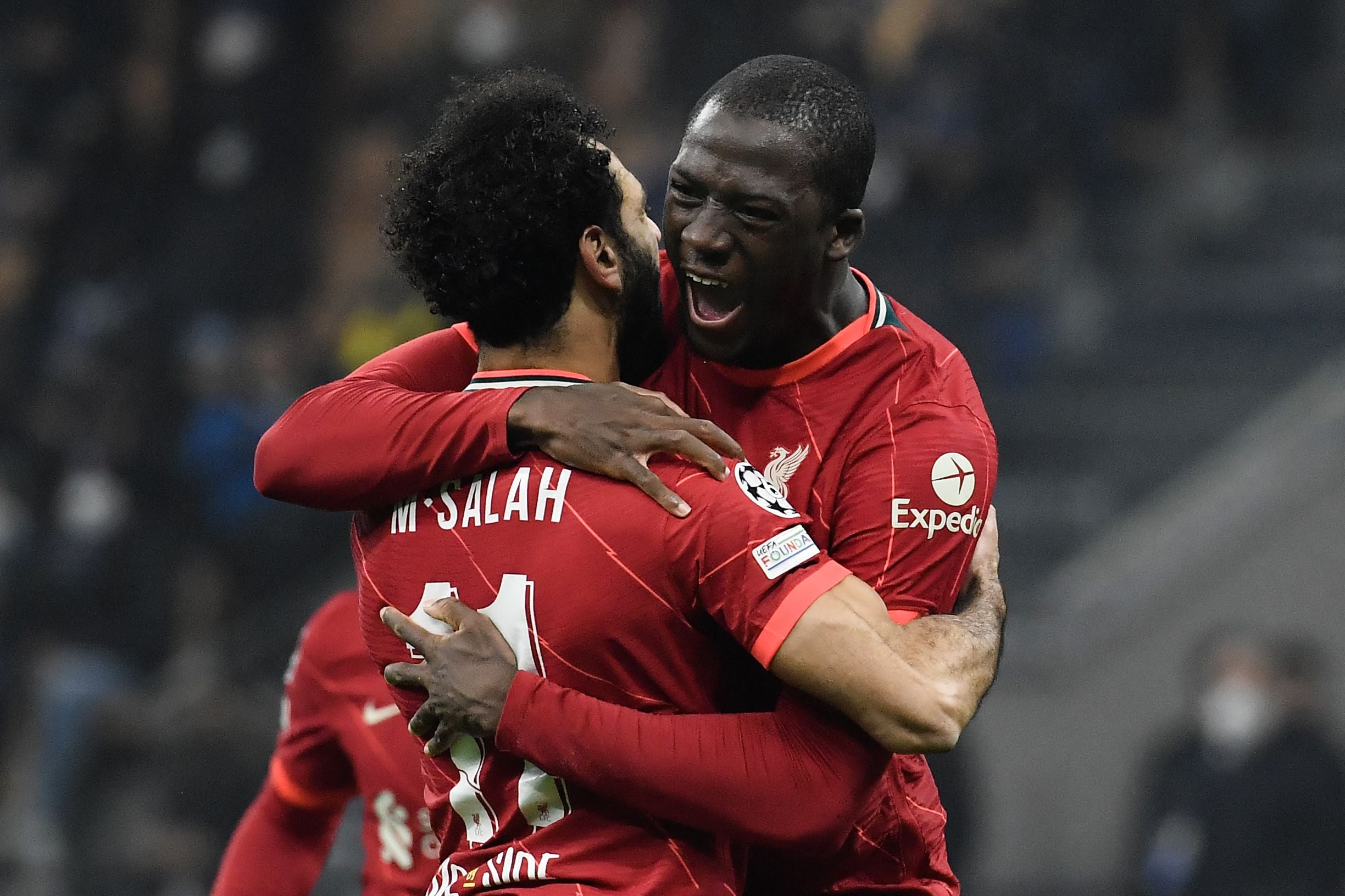 Mohamed Salah celebrates with Ibrahima Konate at the San Siro