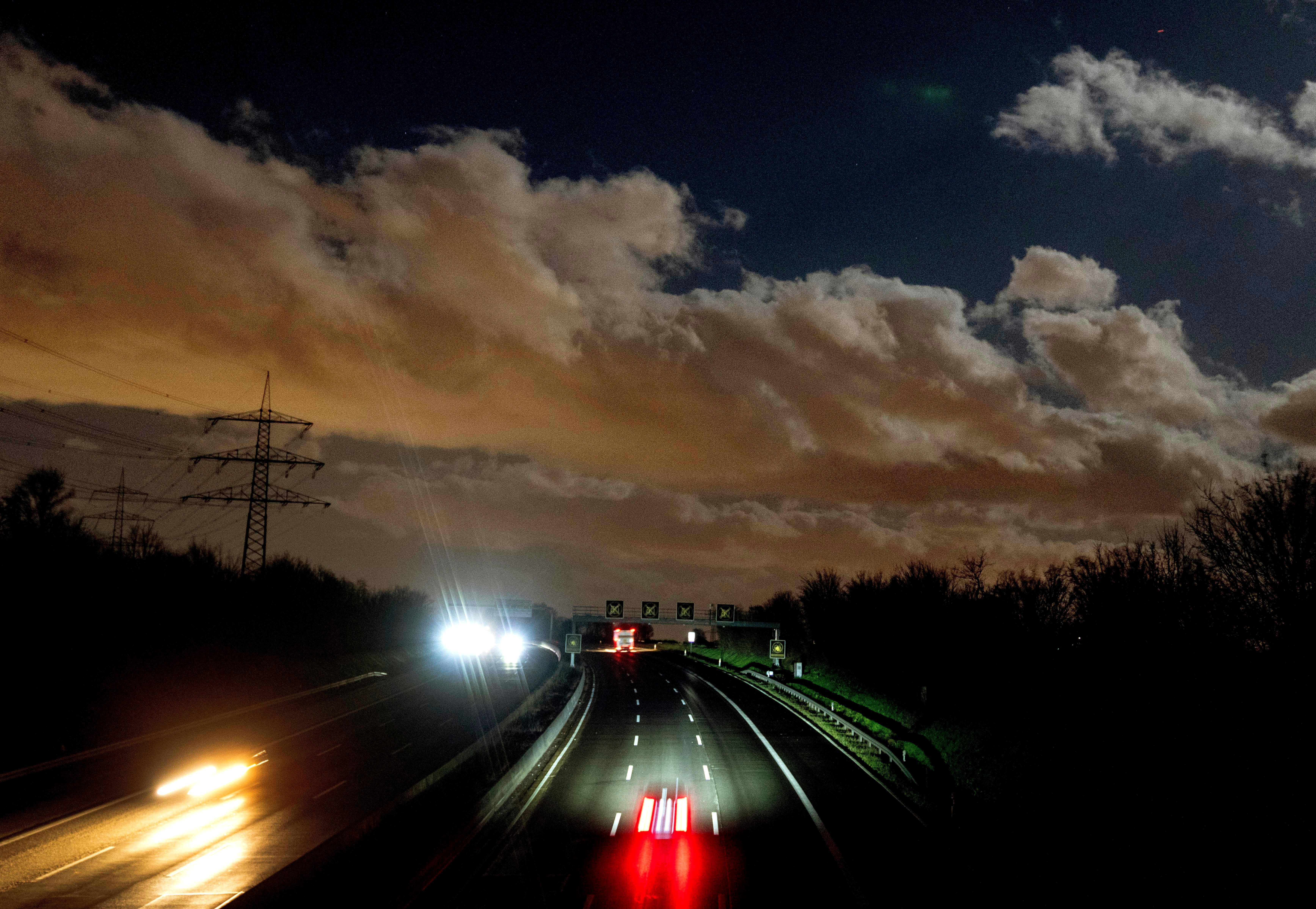 Clouds drift over a highway in Frankfurt, Germany, on a stormy Thursday