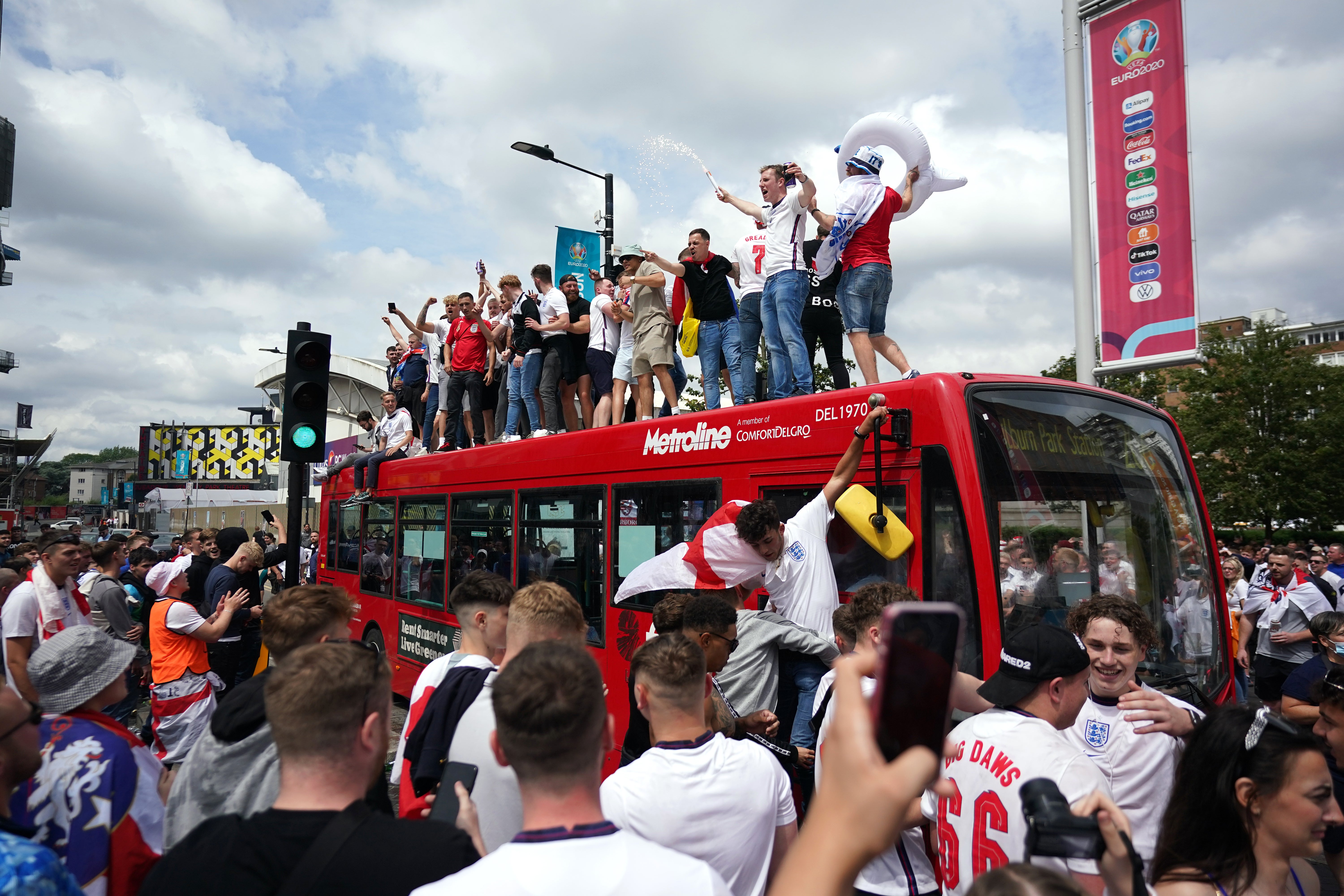 England fans on a bus ahead of the Euro 2020 final (Zac Goodwin/PA)