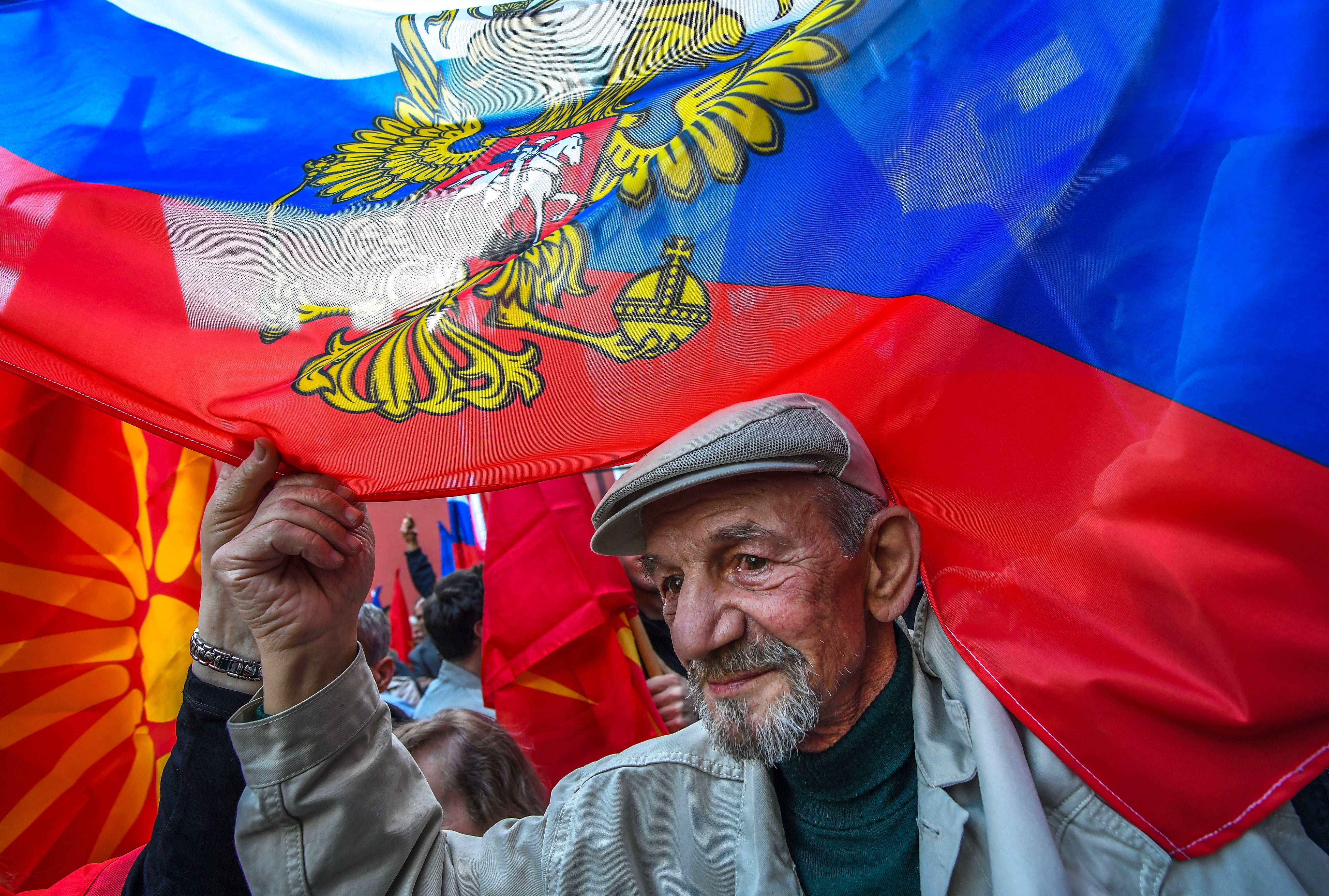 Macedonians in Skopje wave Russian and old Macedonian flags as a sign of support for Russia