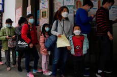 Hong Kong parents race to vaccinate young children as Covid surges