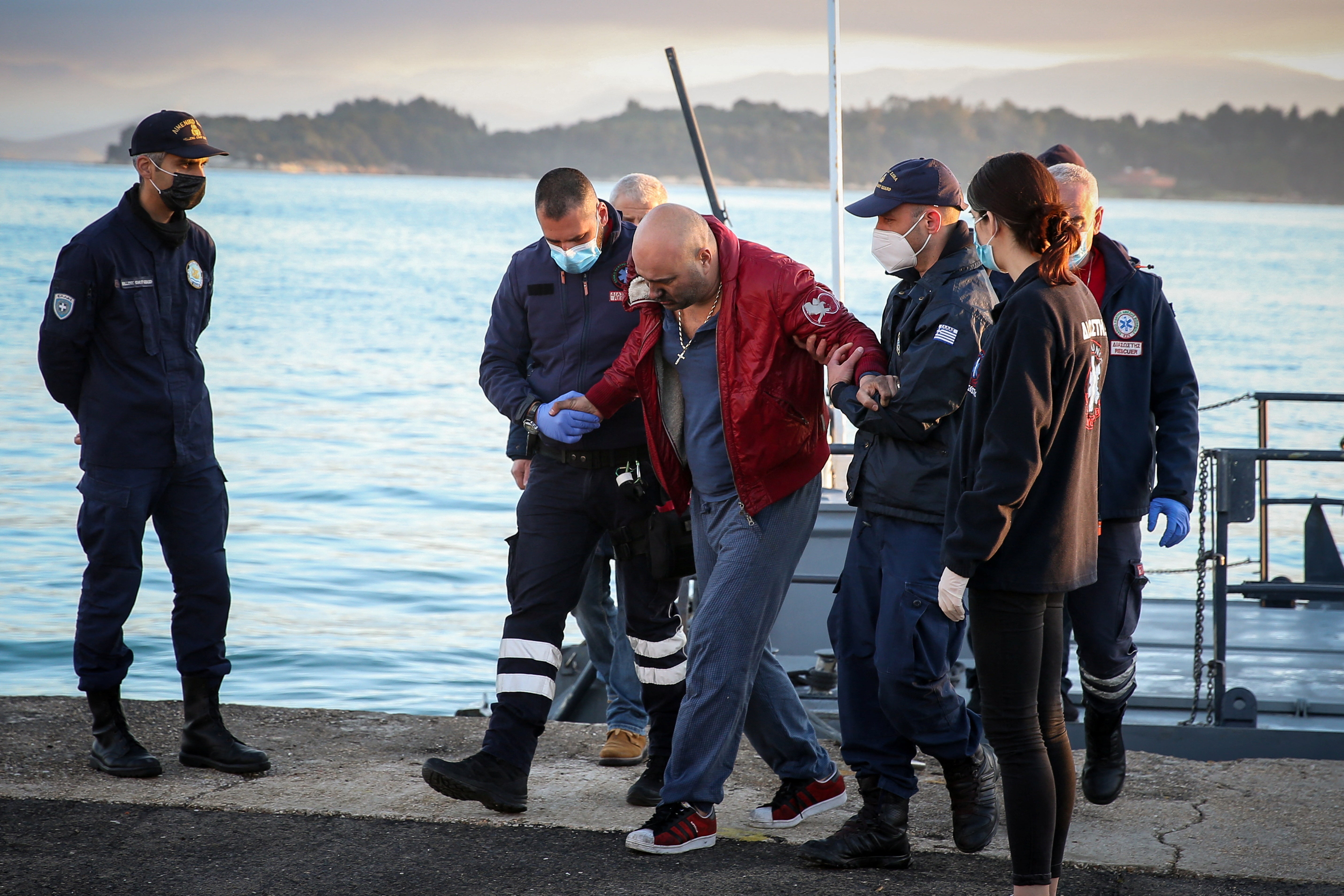 A passenger from Euroferry Olympia disembarks at the port of Corfu