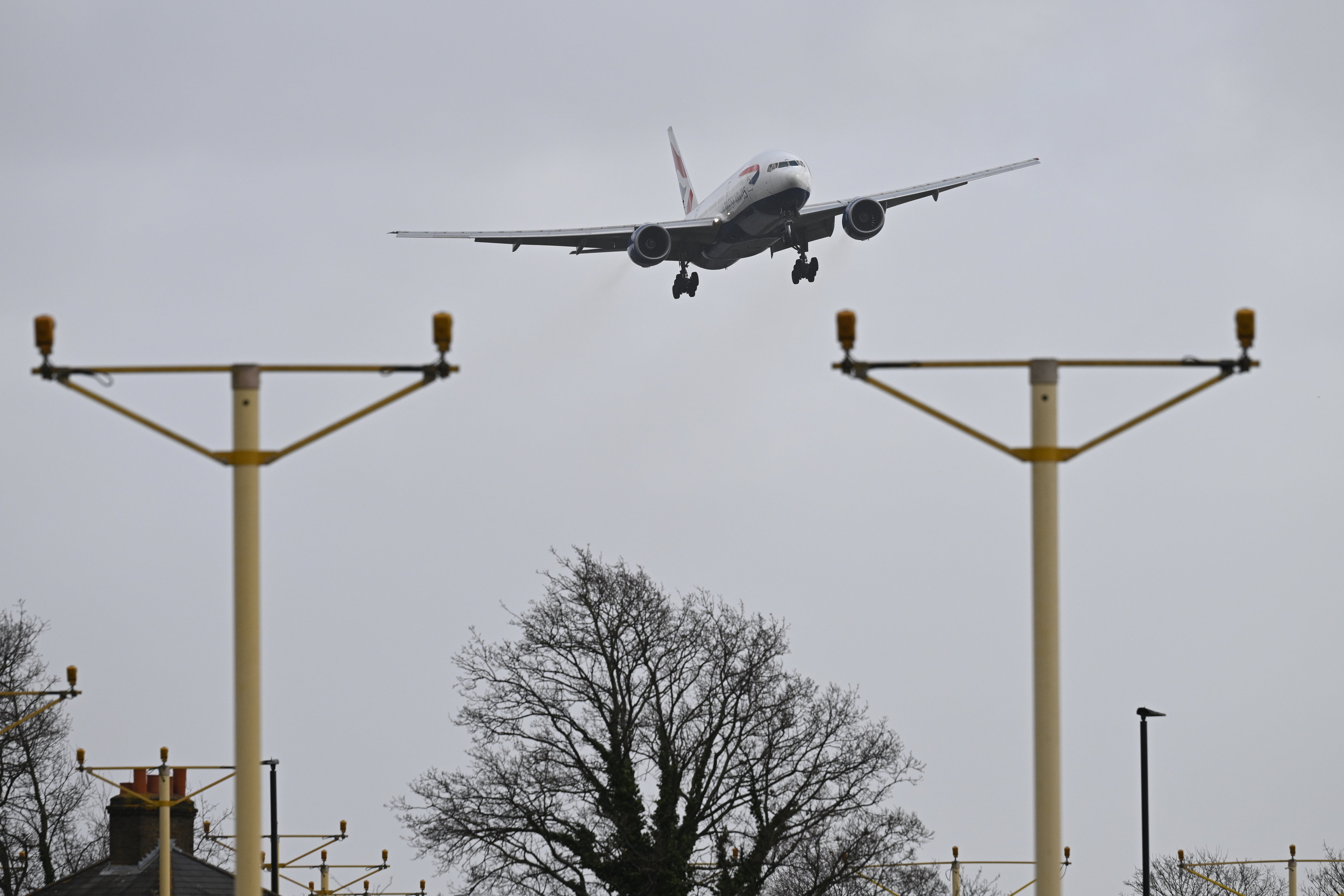 A British Airways passenger plane struggles with the high winds on approach to Heathrow Airport