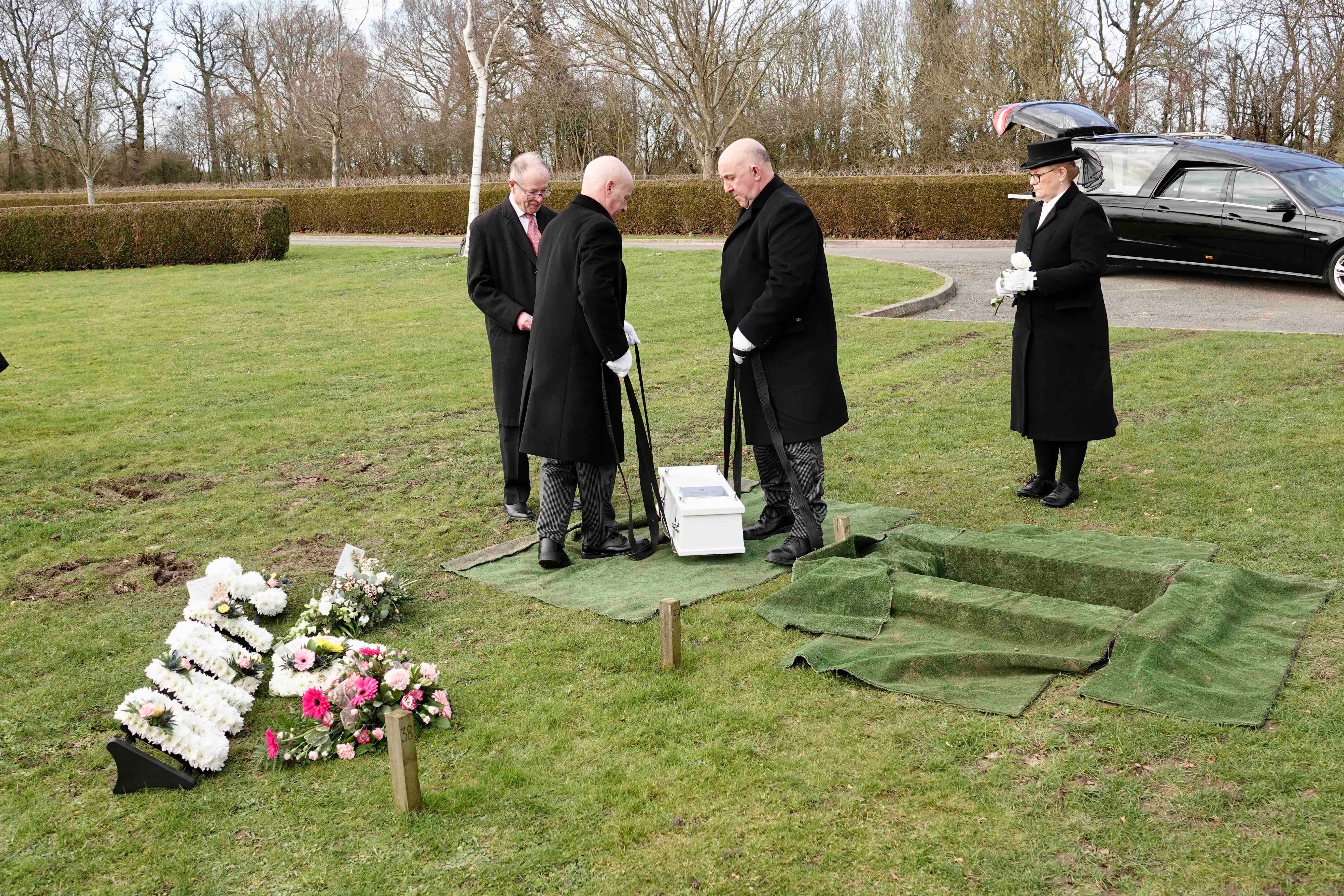 A crowd of 15 mourners including police, council officials and six staff from the recycling firm where Baby S was found gathered to say their final farewell to her