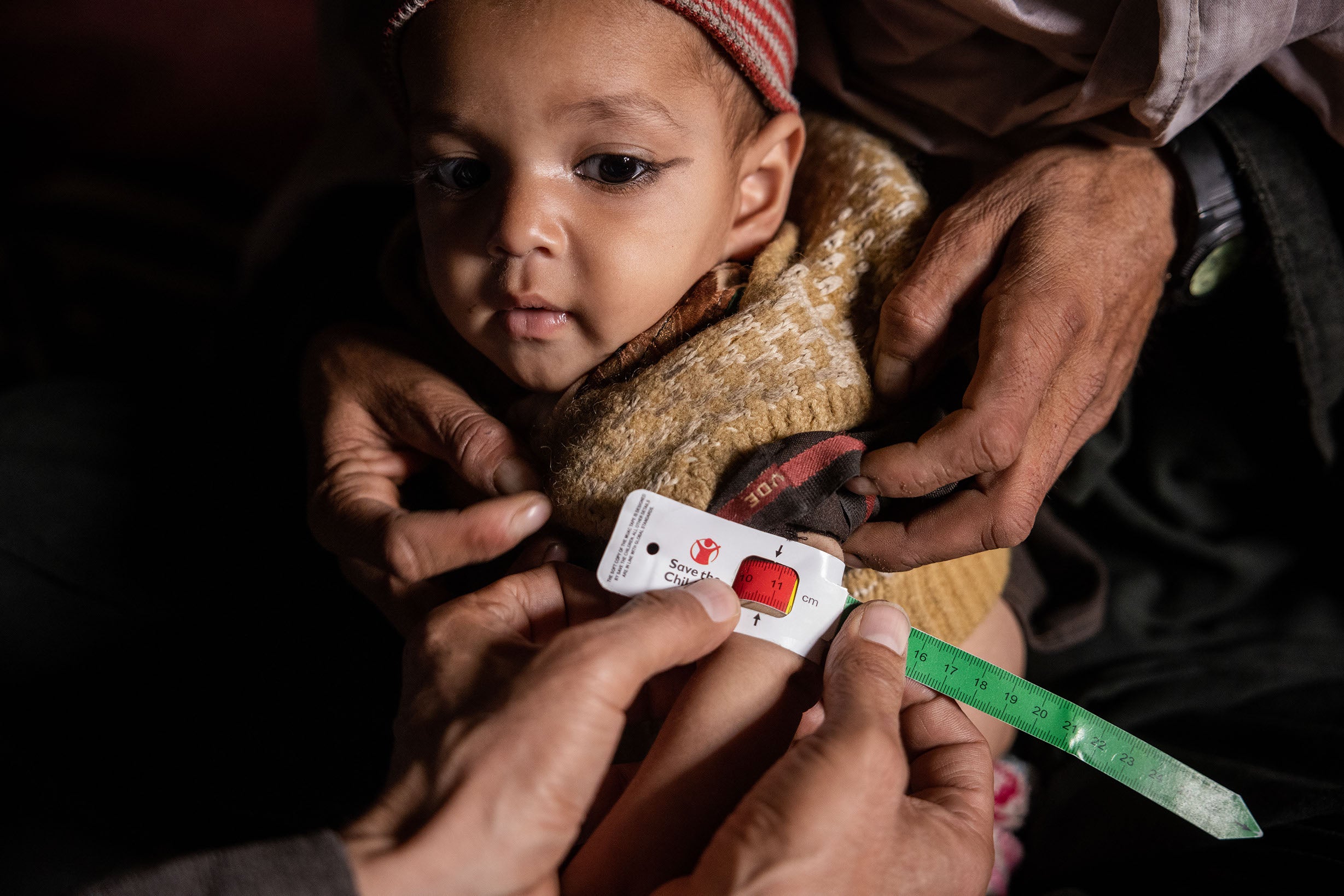 Mohammad* and his wife Gulalai’s* one-year-old son, Ninangyali*, who is suffering from severe acute malnutrition