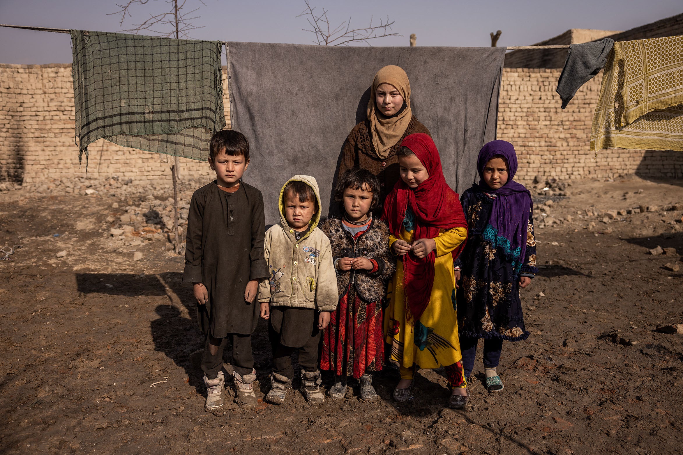 Arzoo* 12, with her siblings at home