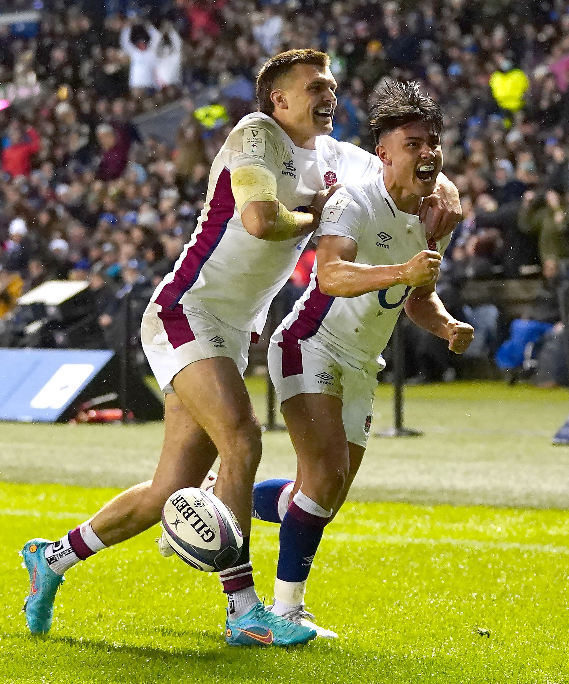 Marcus Smith (right) celebrates with Henry Slade after scoring England’s first try against Scotland (Jane Barlow/PA)