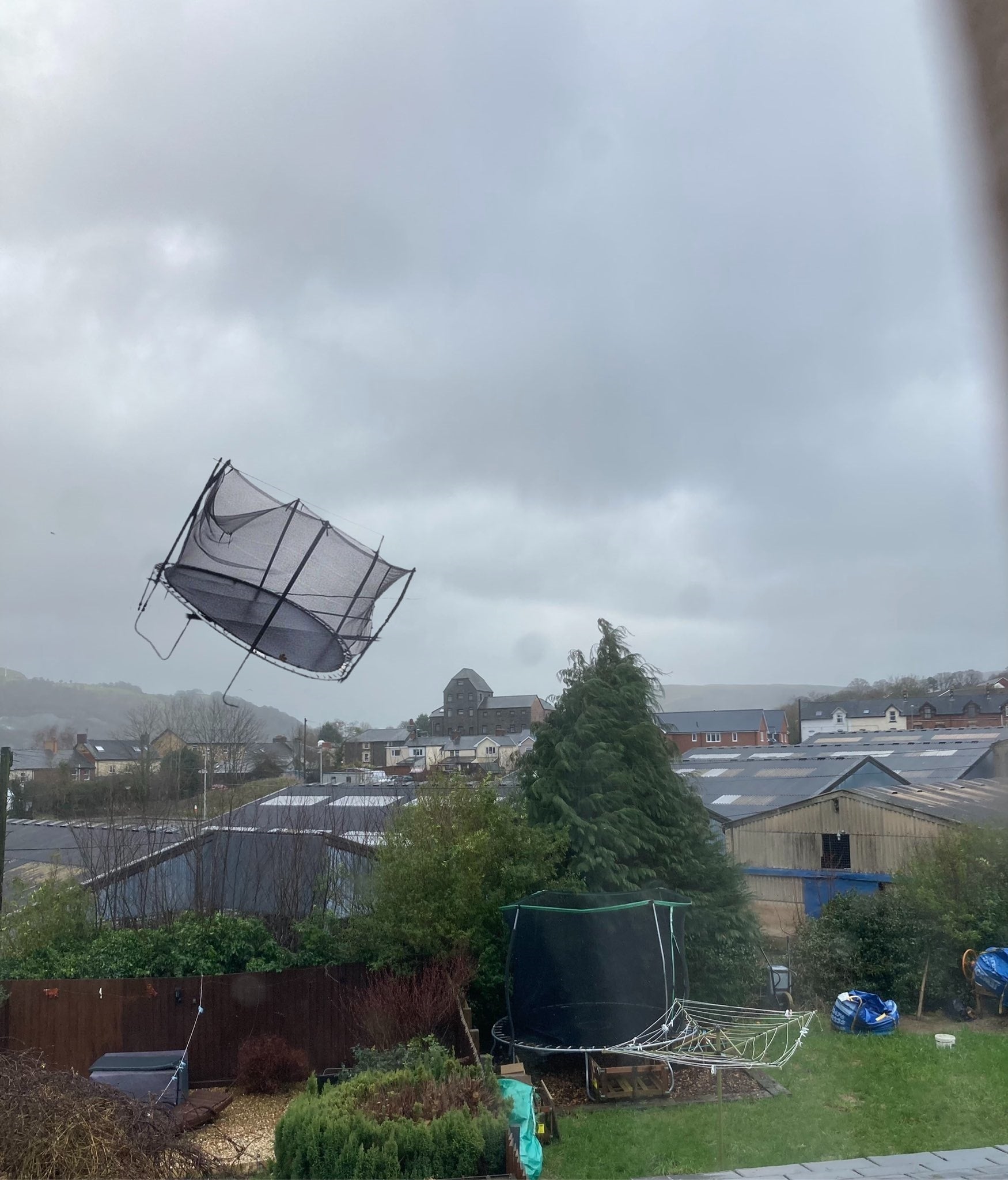 A trampoline flying mid air during Storm Eunice in Builth Wells, mid Wales