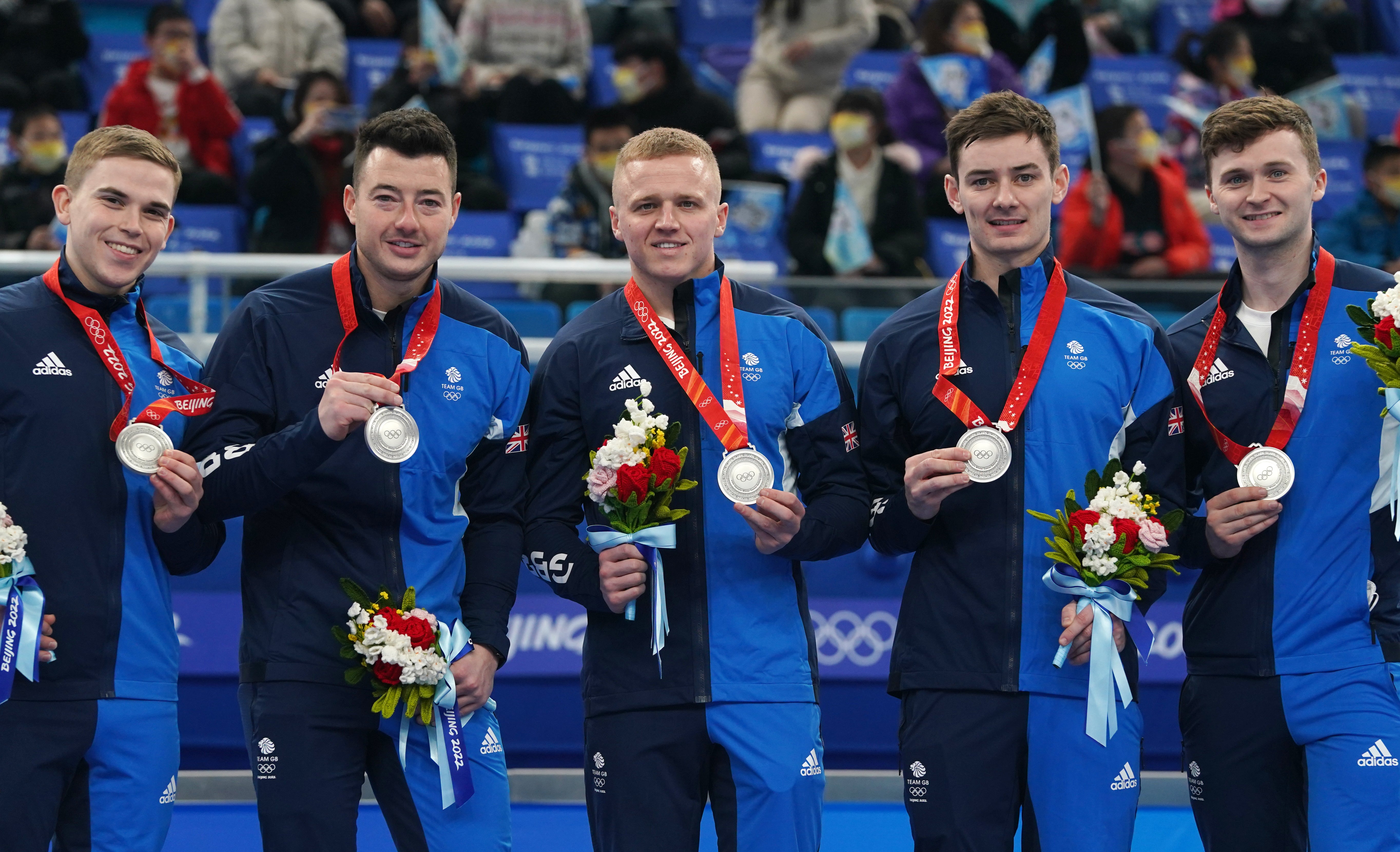 Great Britain’s Ross Whyte, Hammy McMillan, Bobby Lammie, Grant Hardie and Bruce Mouat with their silver medals after losing narrowly to Sweden in the men’s curling final (Andrew Milligan/PA)