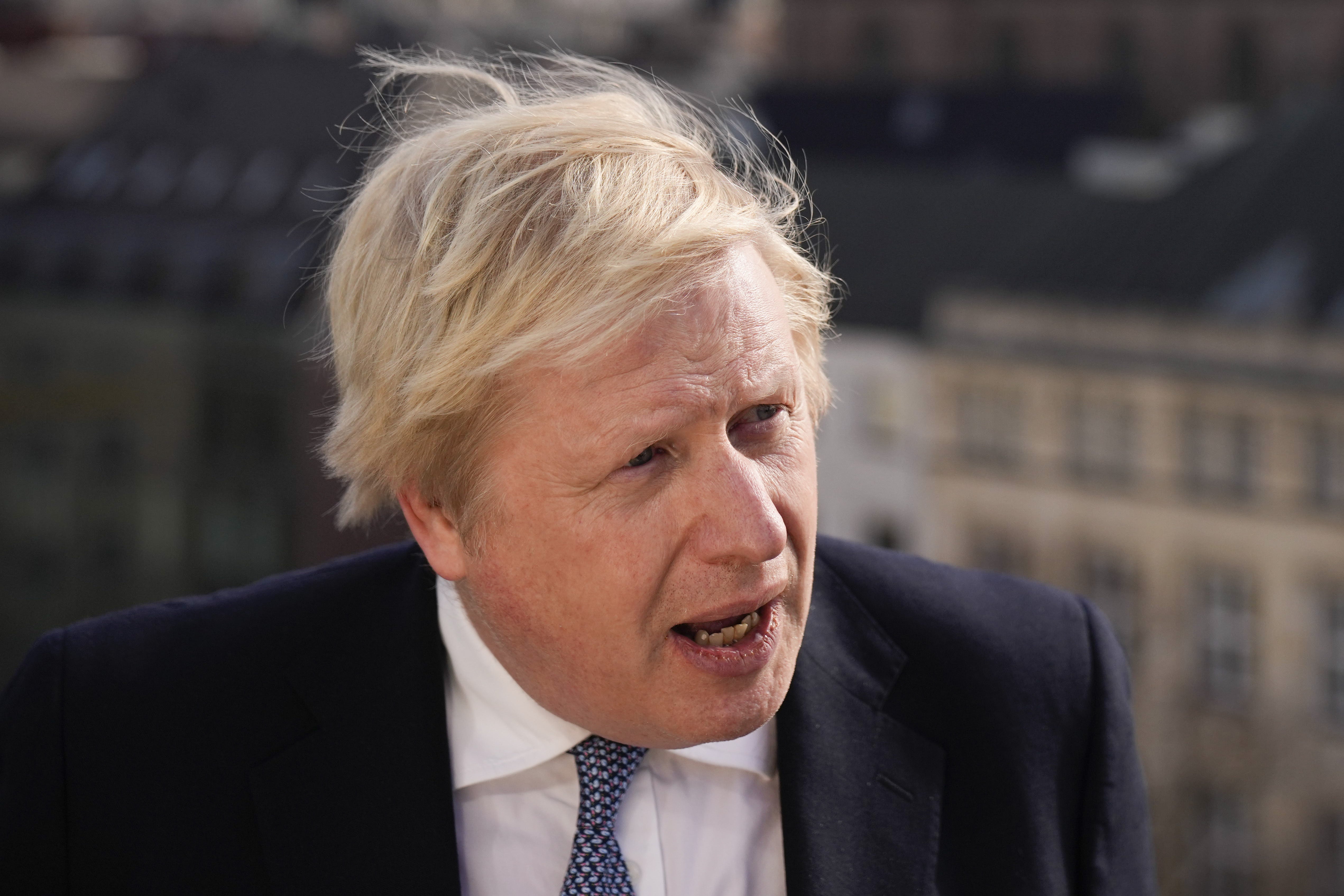 Prime Minister Boris Johnson briefs the media during the Munich Security Conference where he has pressed for diplomacy with Russia to continue (Matt Dunham/PA)