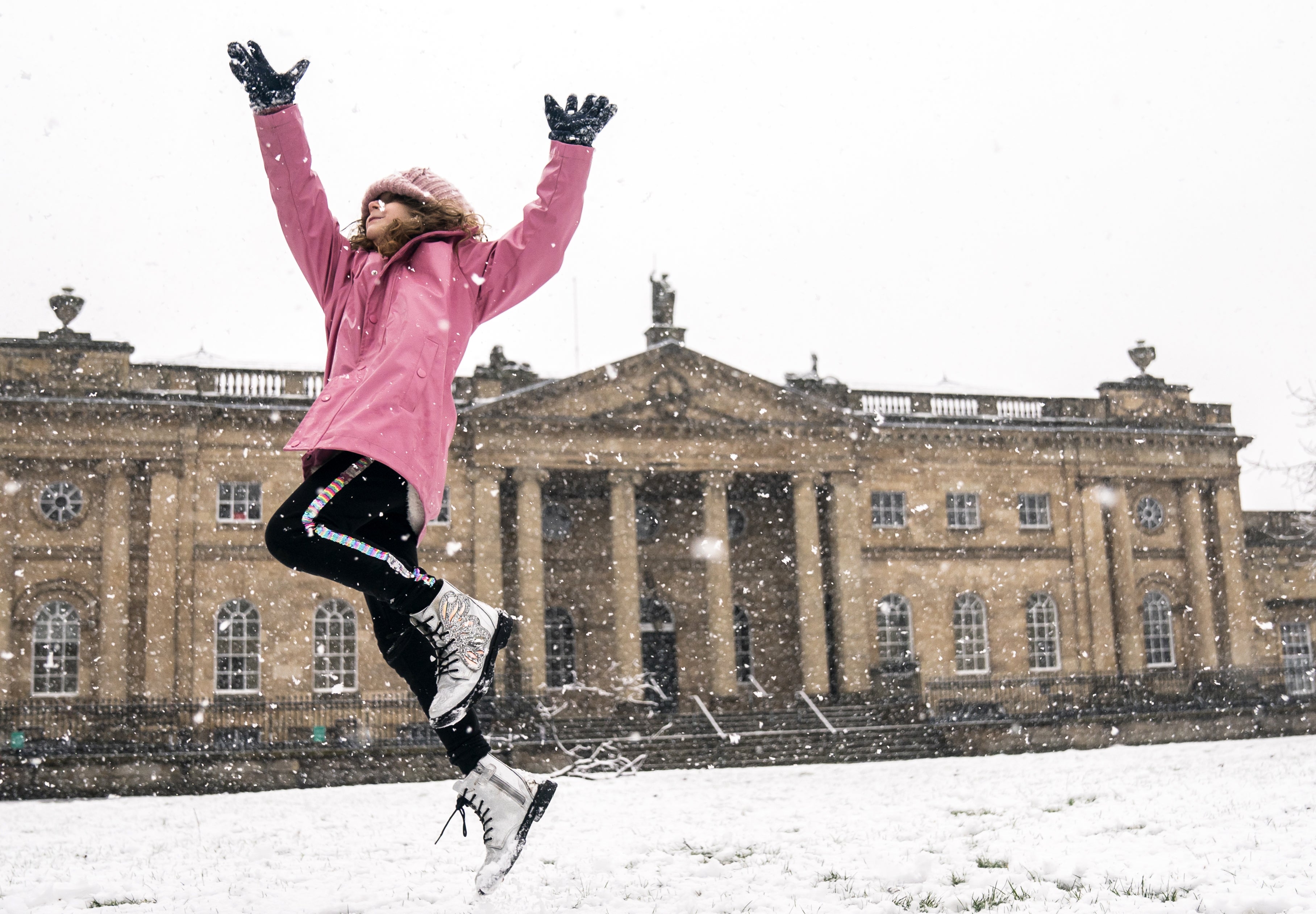 A young girl enjoys the snow in York