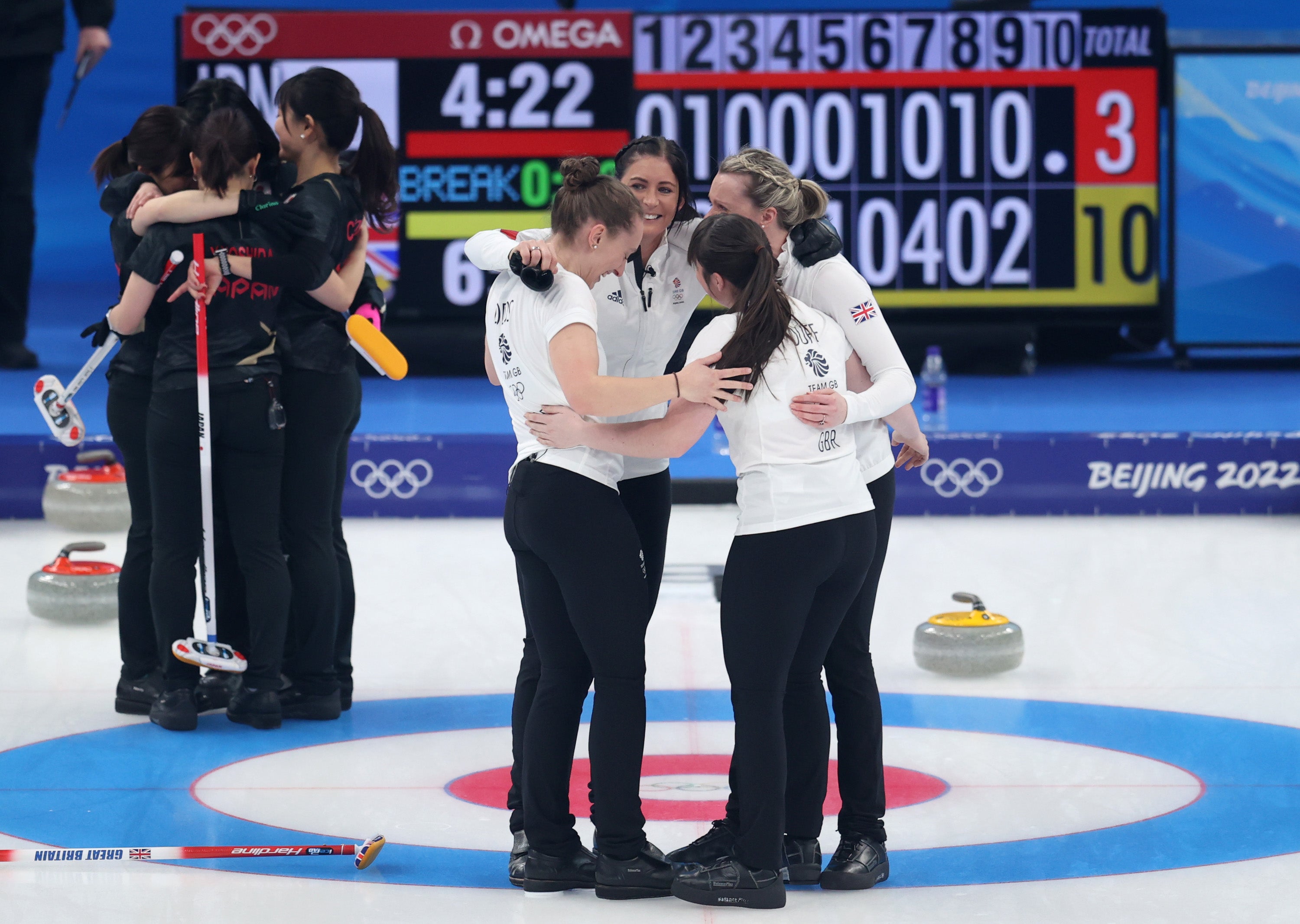 Team Great Britain celebrate after defeating Team Japan