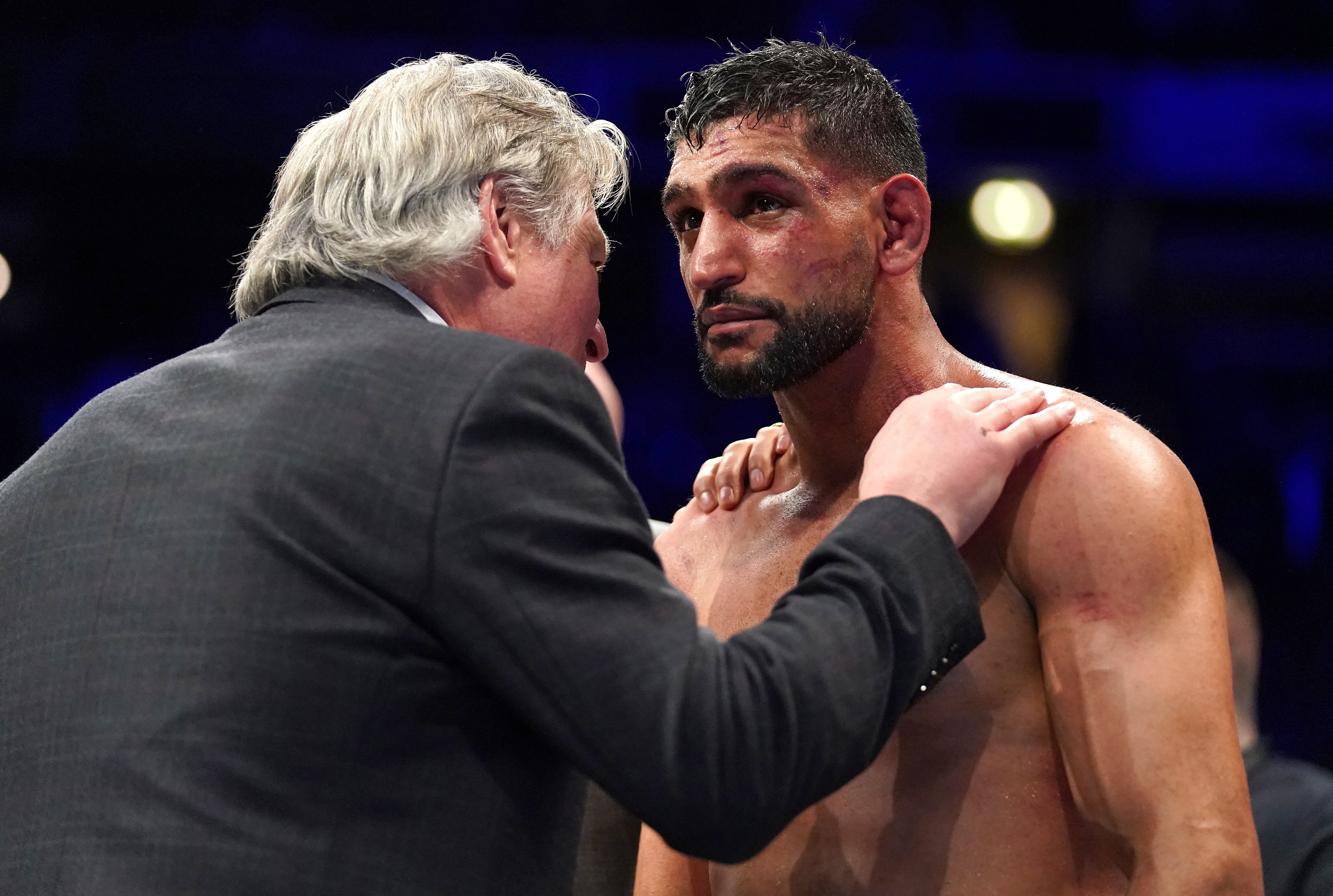 Amir Khan, right, was outclassed by Kell Brook (Nick Potts/PA)