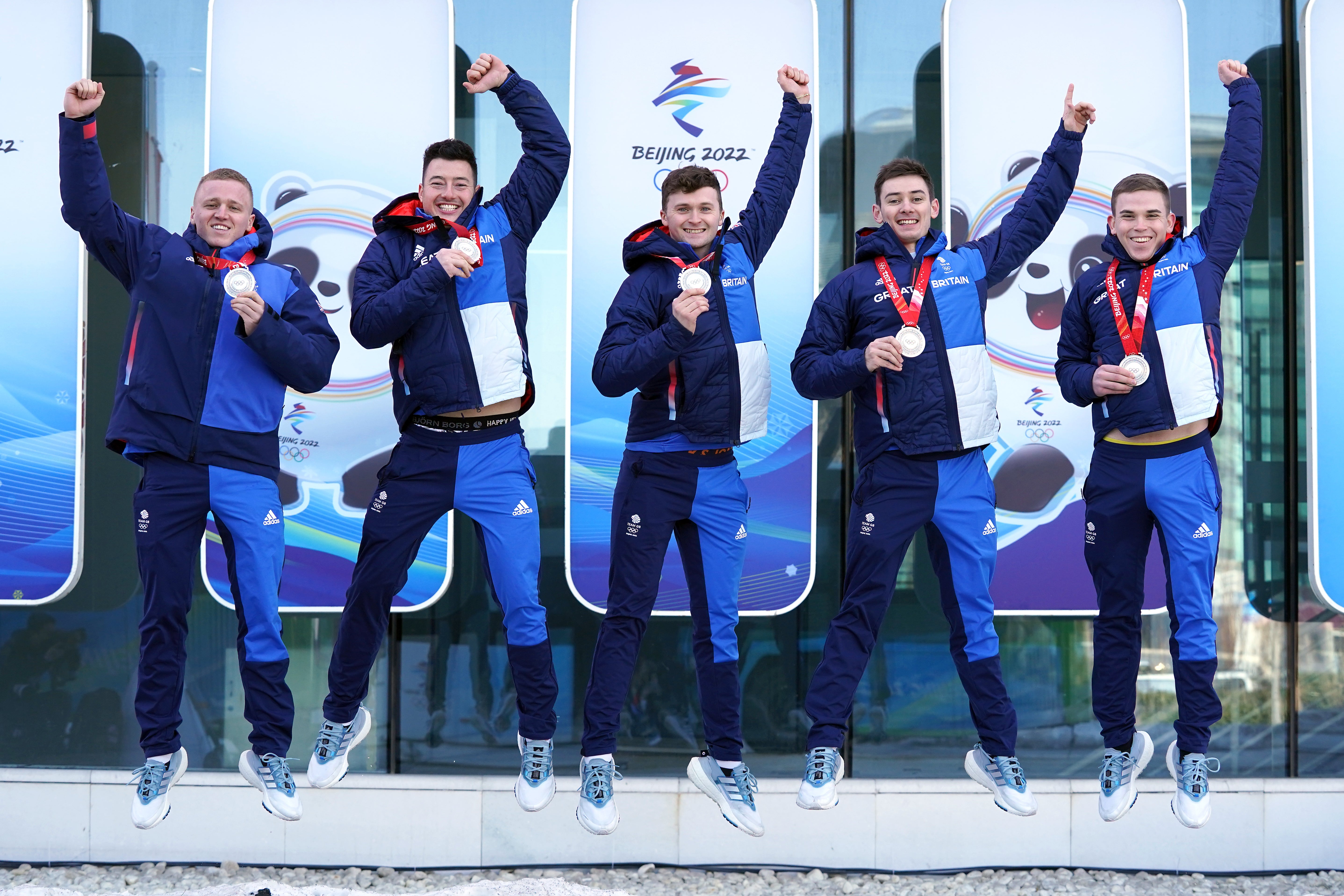 Great Britain’s Bobby Lammie, Hammy McMillan, Bruce Mouat, Grant Hardie and Ross Whyte celebrate with their men’s curling silver medals (Andrew Milligan/PA Images).