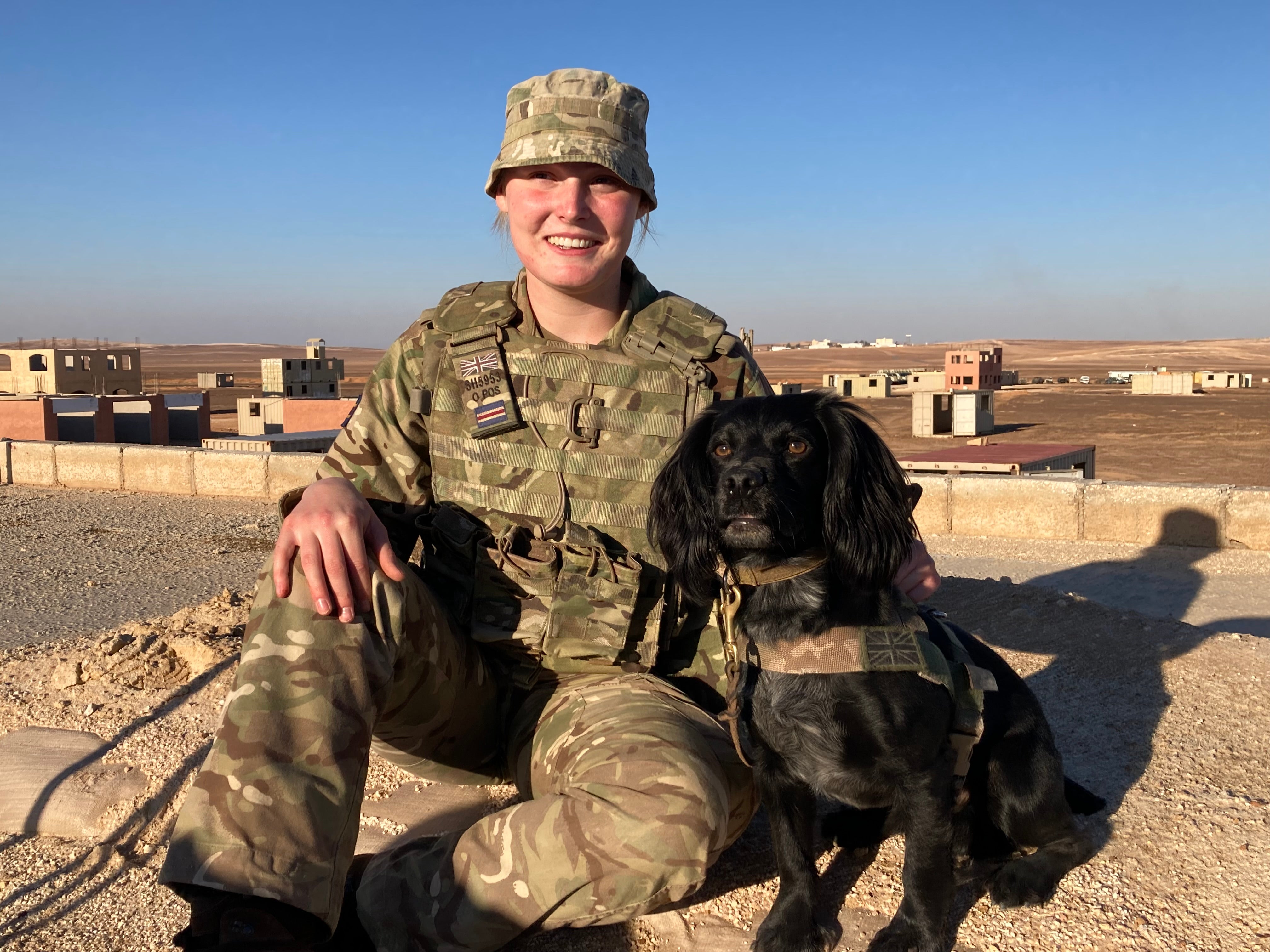 Molly Shaw of the Royal Army Veterinary Corps with service animal Ace (Rebecca Black/PA)