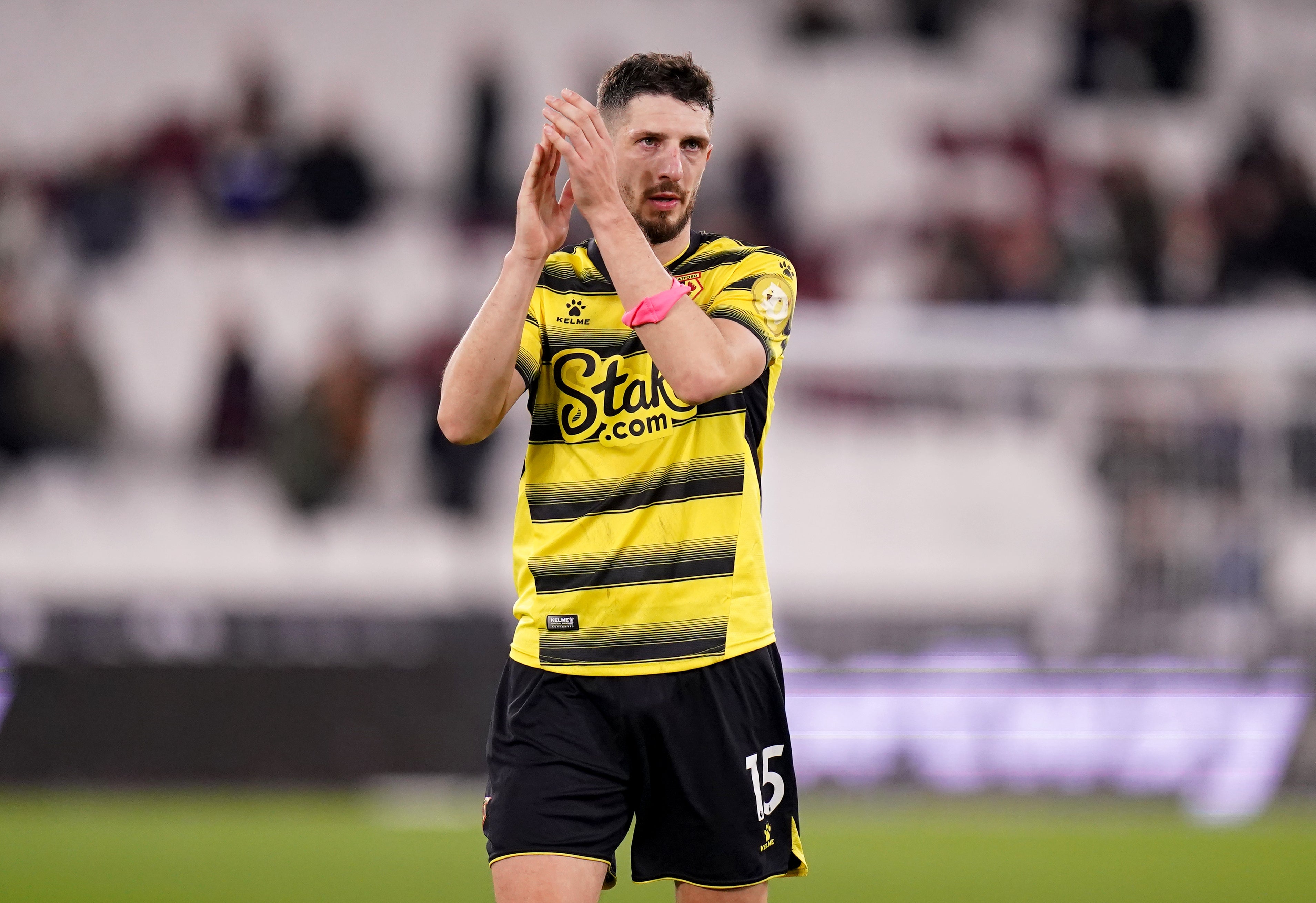 Craig Cathcart applauds the fans (Adam Davy/PA)