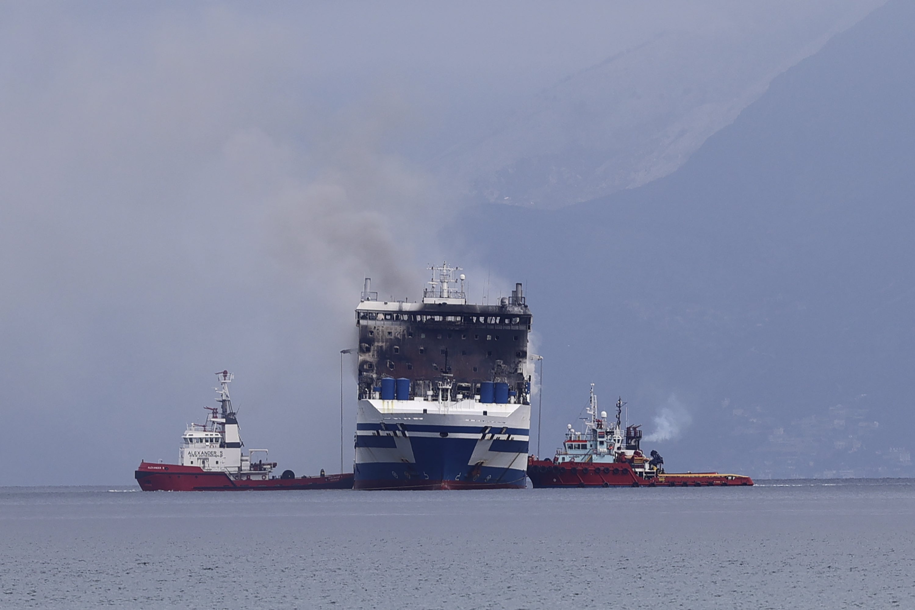 Firefighting vessels continue works to extinguish the fire onboard the ferry