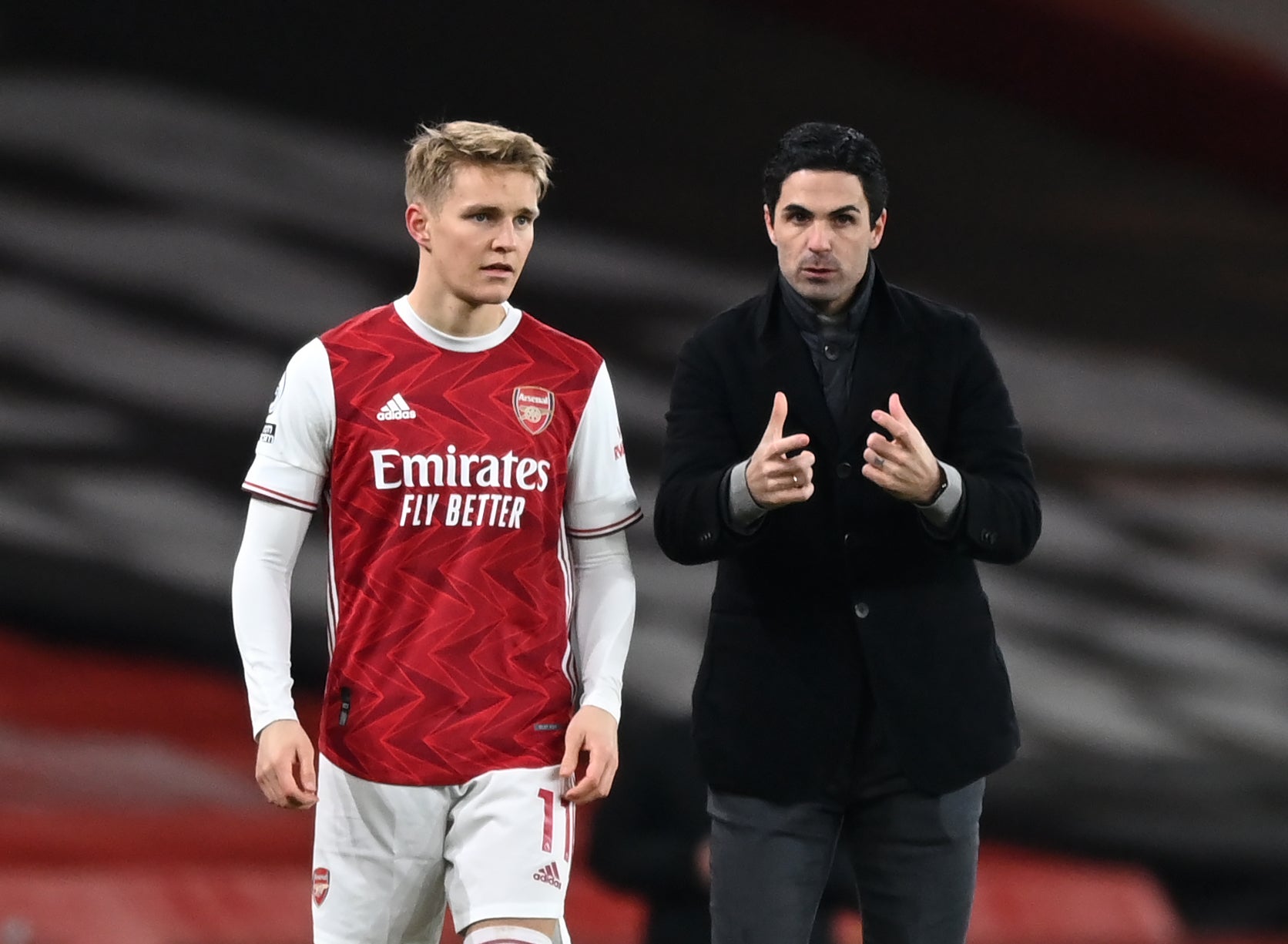 Arsenal manager Mikel Arteta instructs Arsenal’s Martin Odegaard before he goes on during the Premier League match at the Emirates Stadium, London. Picture date: Saturday January 30, 2021.