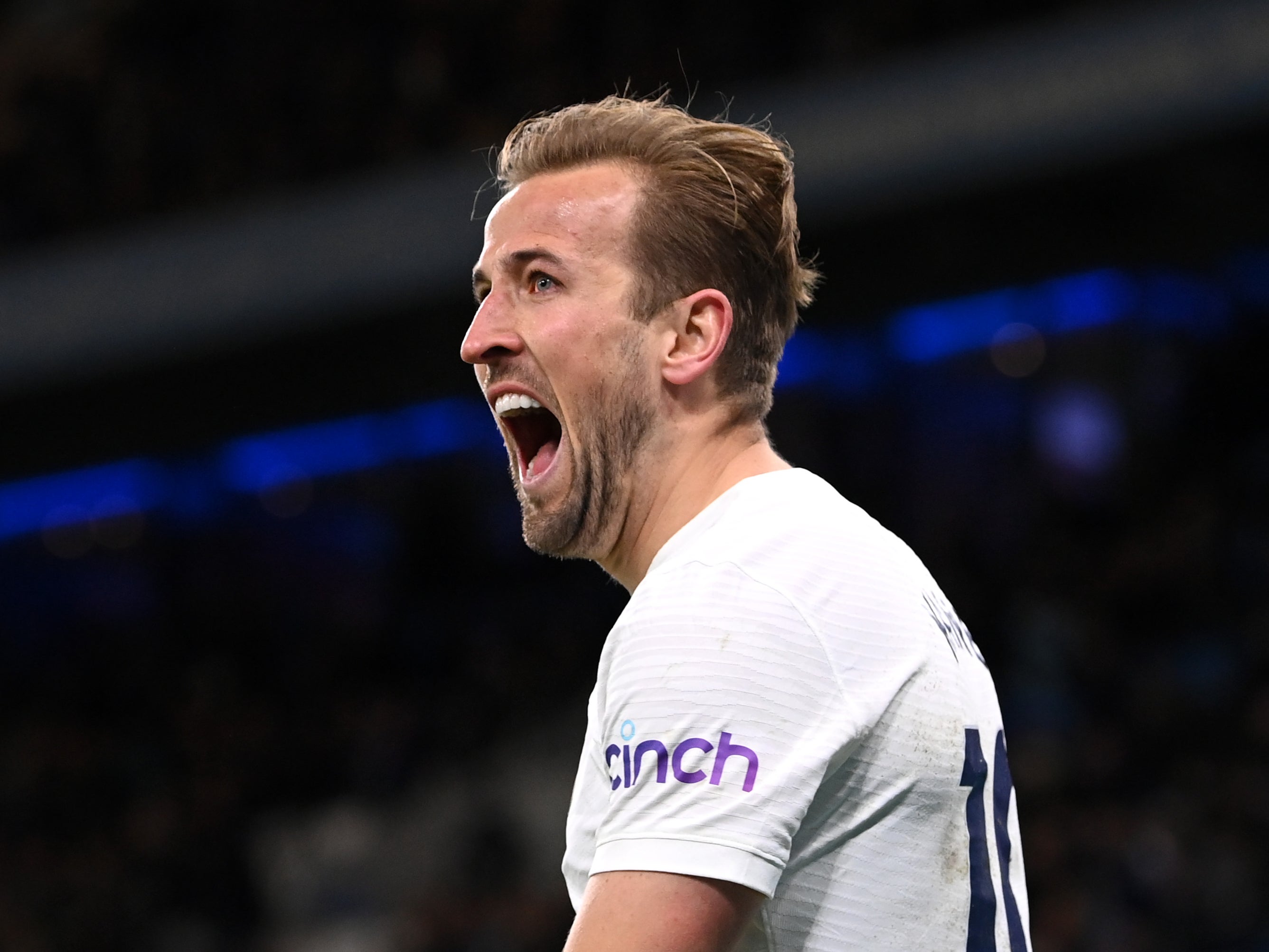 Harry Kane celebrates scoring against Manchester City