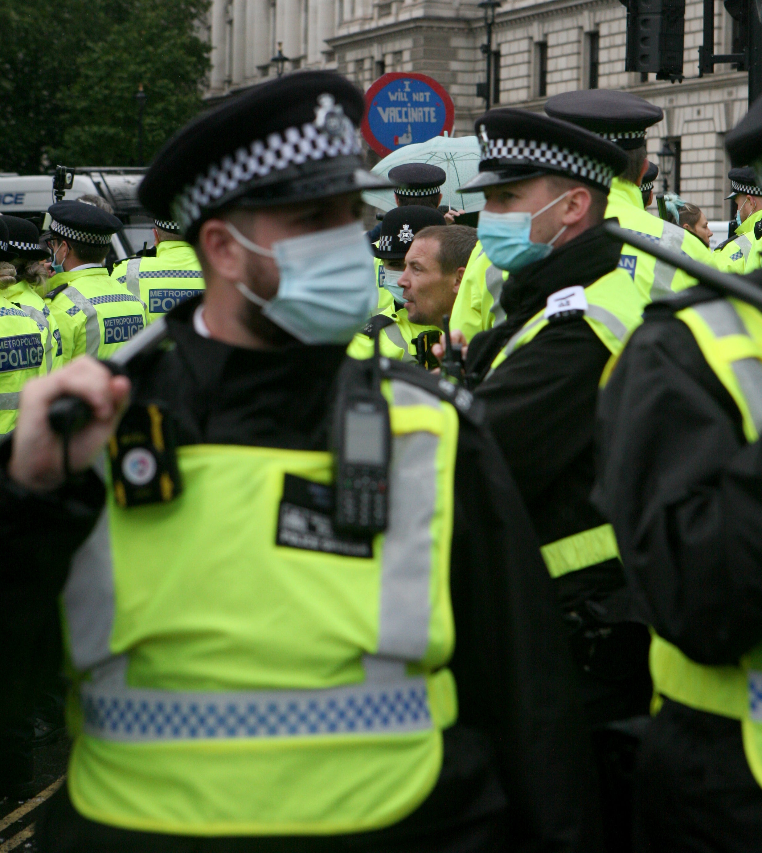 Police officers at an anti-lockdown protest in Parliament Square, London (PA)