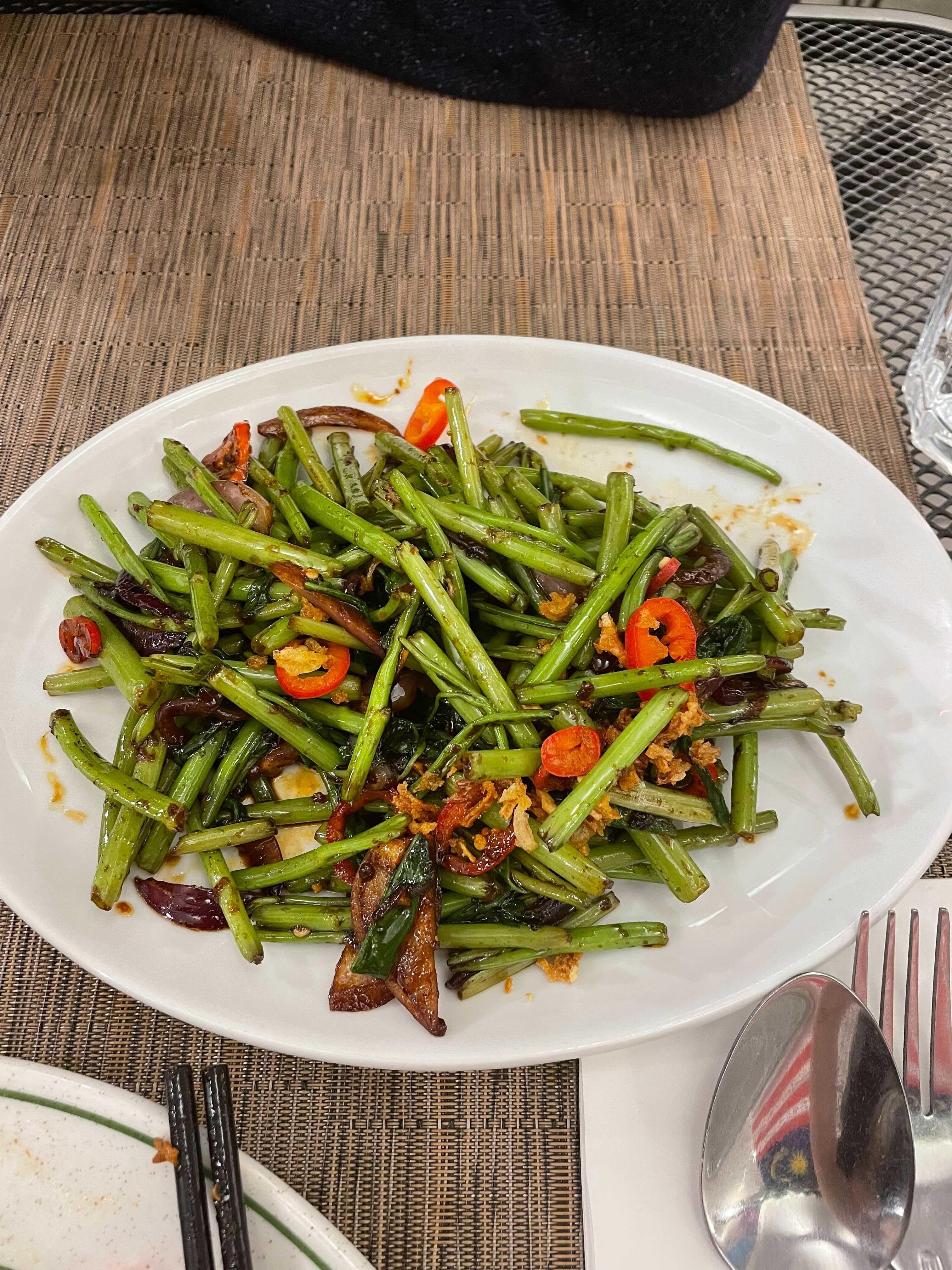 Some morning glory stir fried with shrimp paste and chillies called kangkung belacan