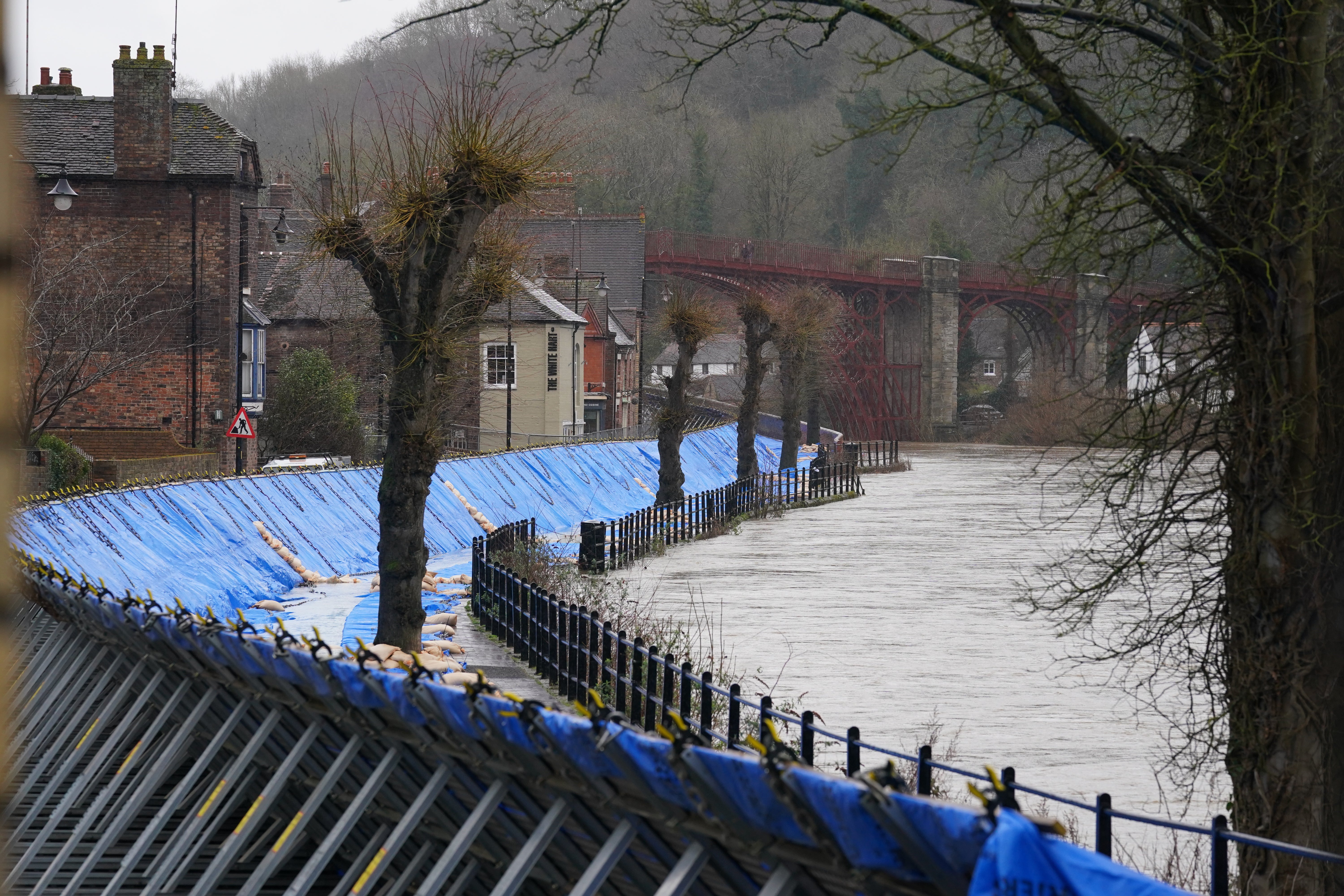 Flood barriers are erected along the River Severn in Ironbridge