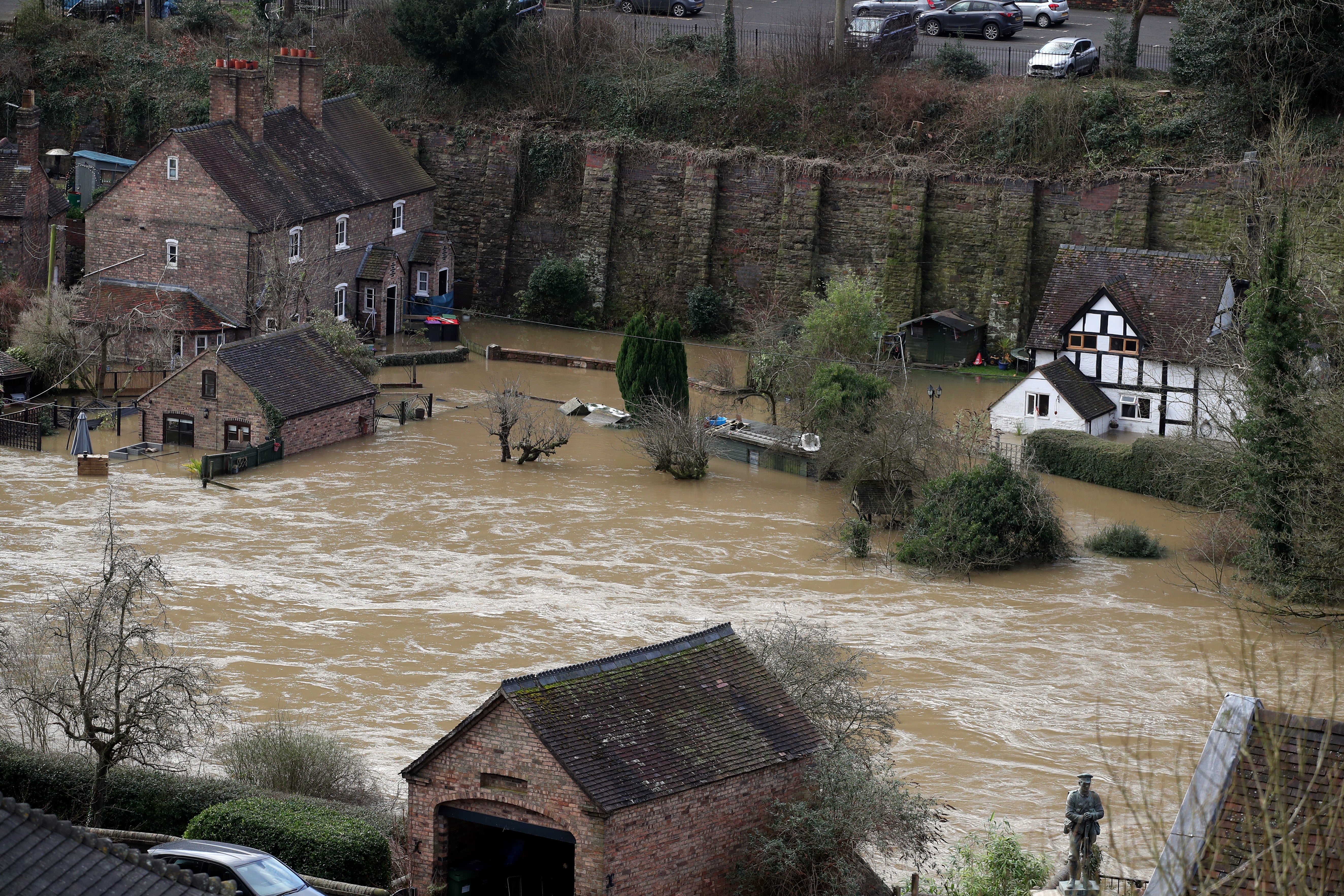 The Vic Haddock boat house under water on the River Severn following high winds and wet weather in Ironbridge, Shropshire