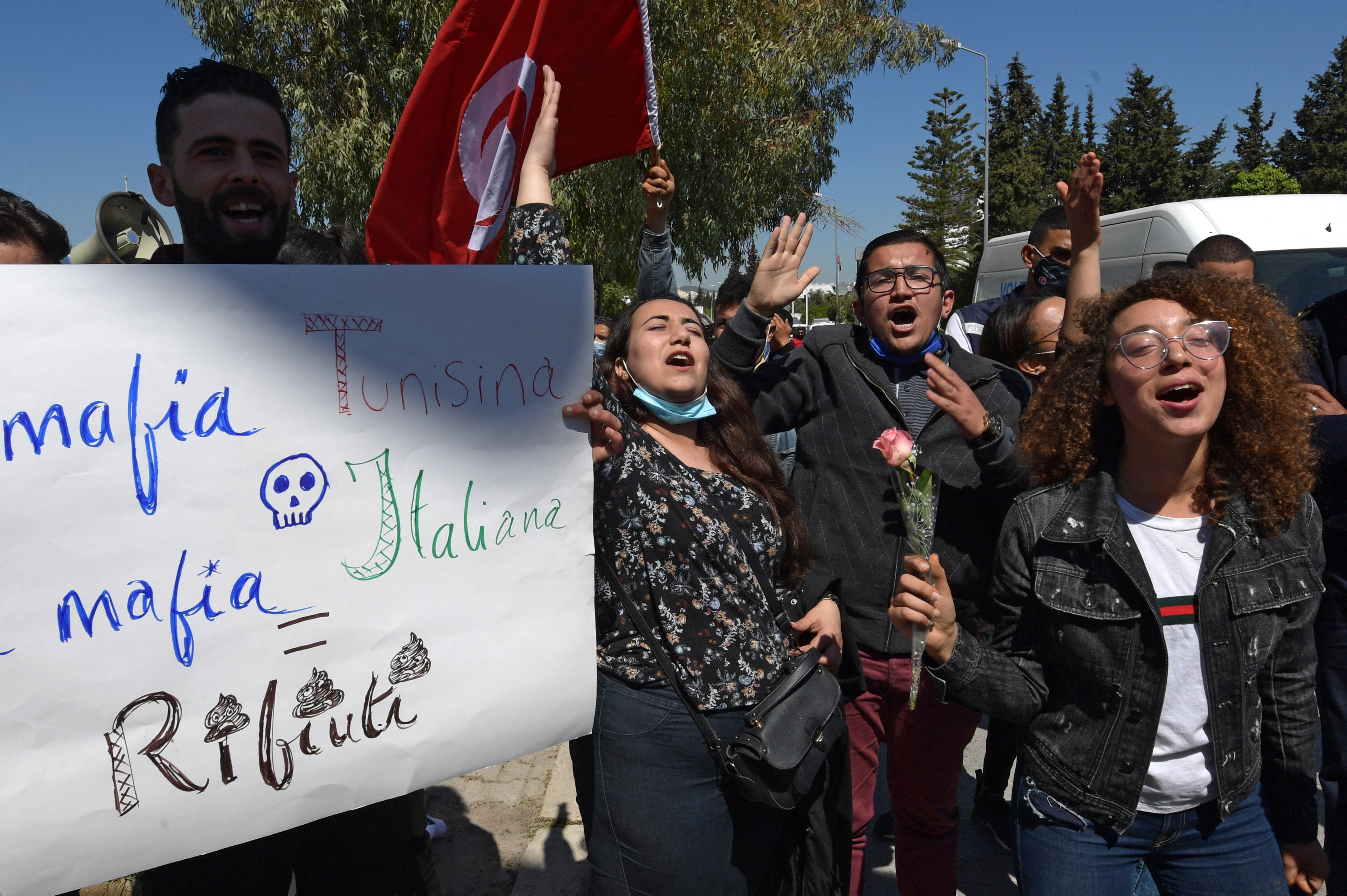 File photo: Tunisian environmental activists demand the return of household waste illegally imported from Italy in Tunis, 1 April 2021