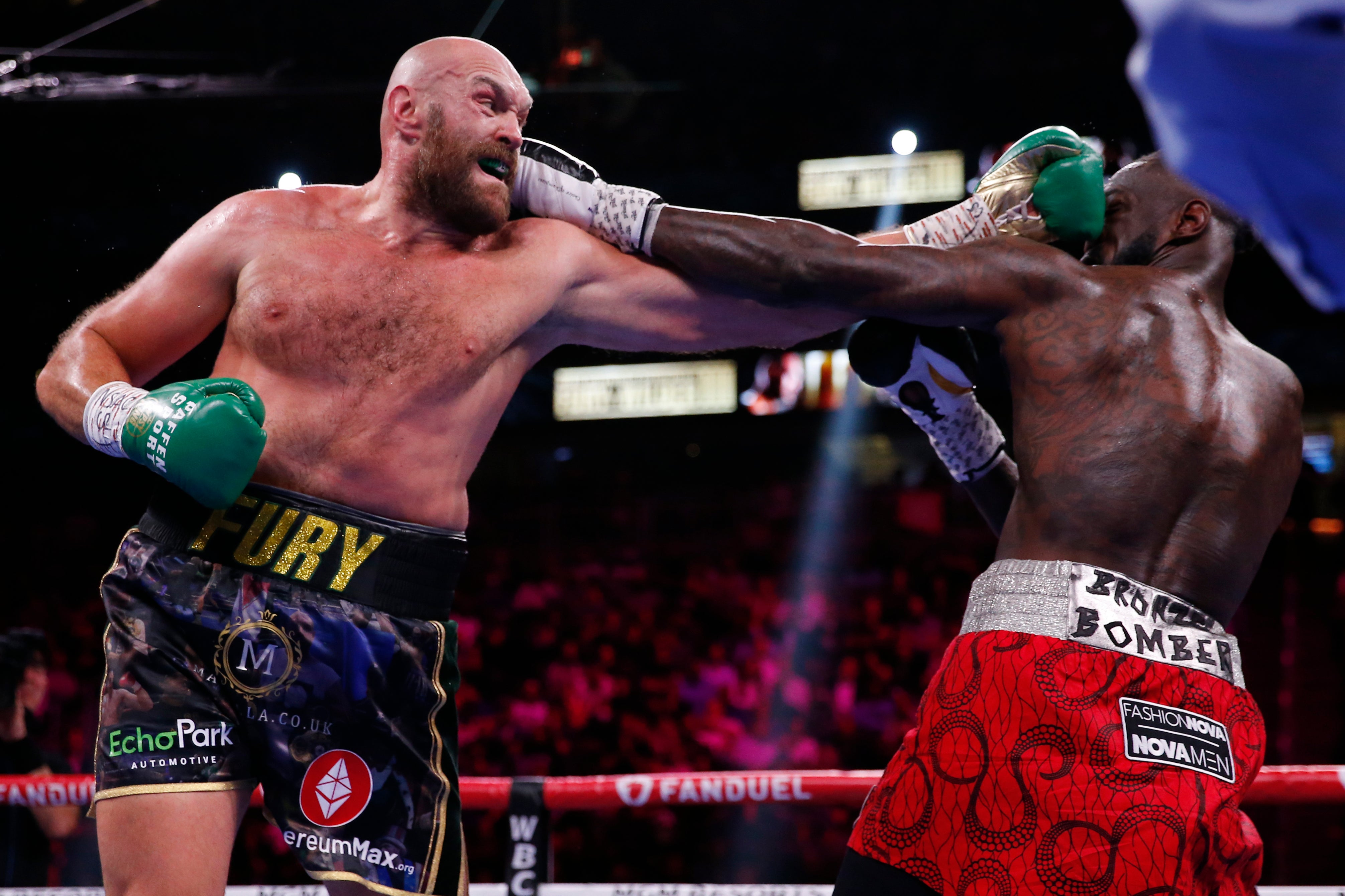 Tyson Fury (left) during his last fight, a stoppage win against Deontay Wilder