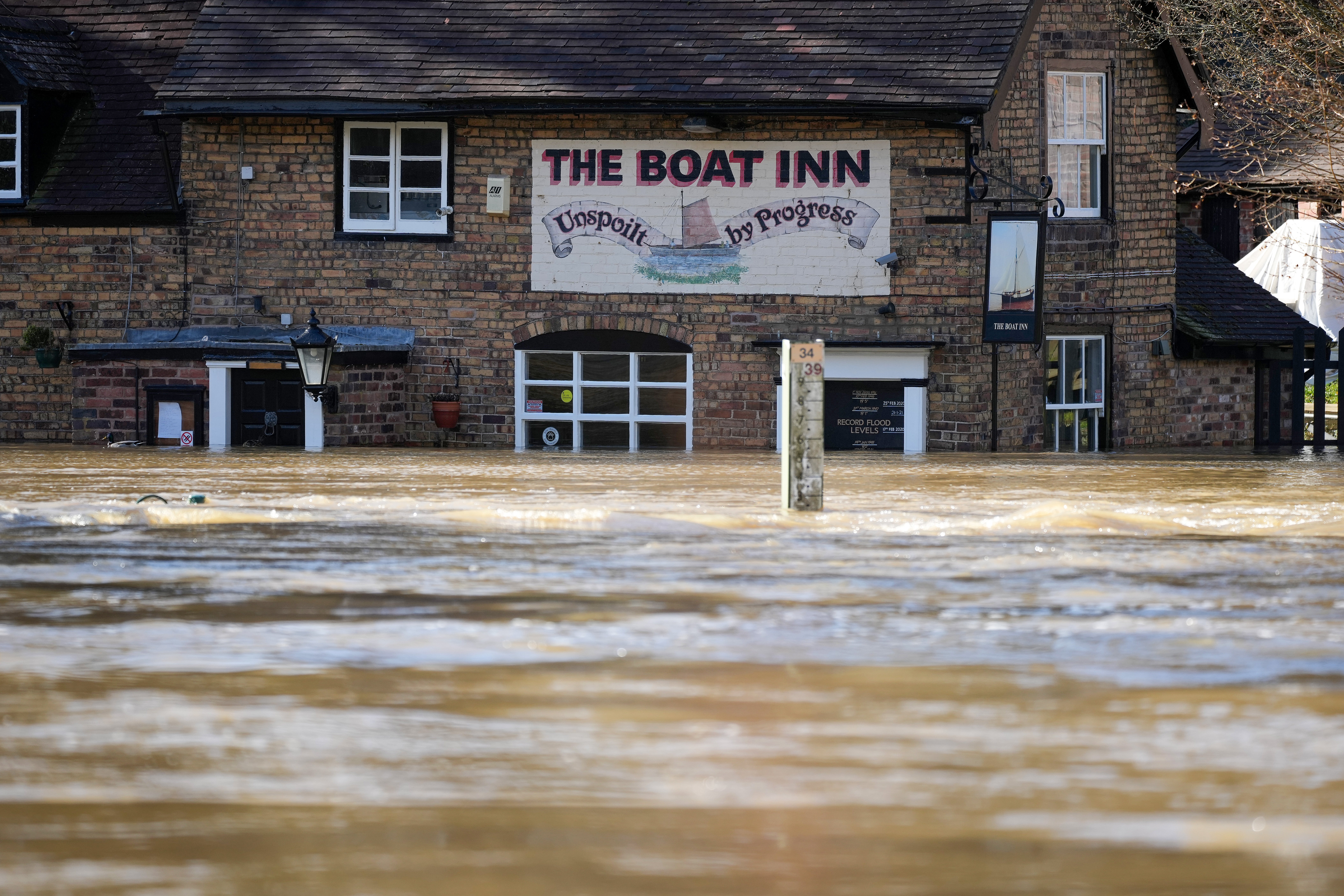 The Boat Inn at Jackfield is marooned by flood water from the River Severn after successive storms hit the UK on 22 February 2022 in Ironbridge, England