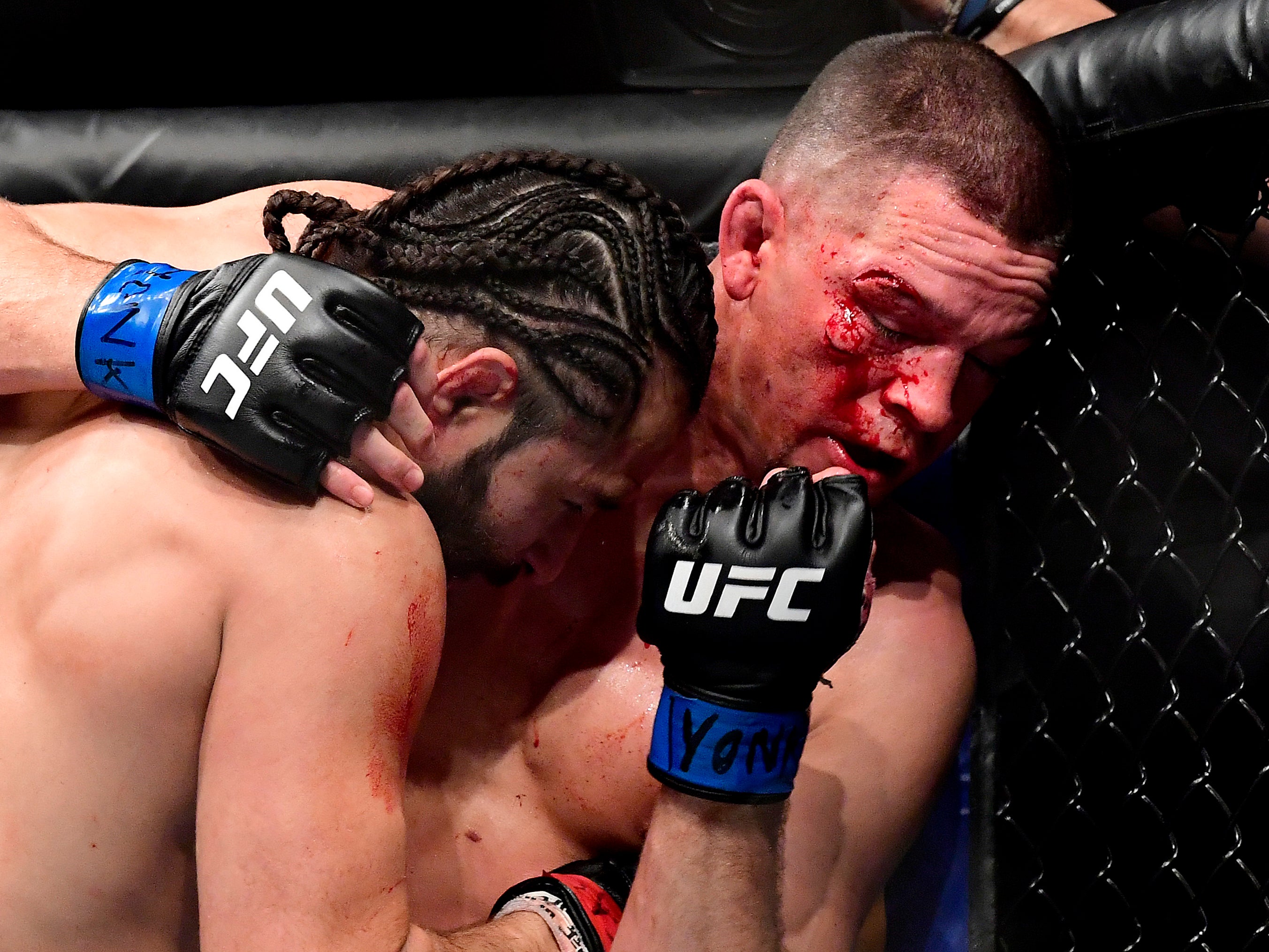 Jorge Masvidal (left) beat Nate Diaz via doctor stoppage in 2019