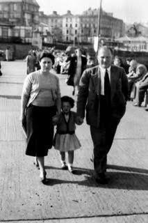 The author at the seaside with her parents – such holidays were ‘the highlight of the year’